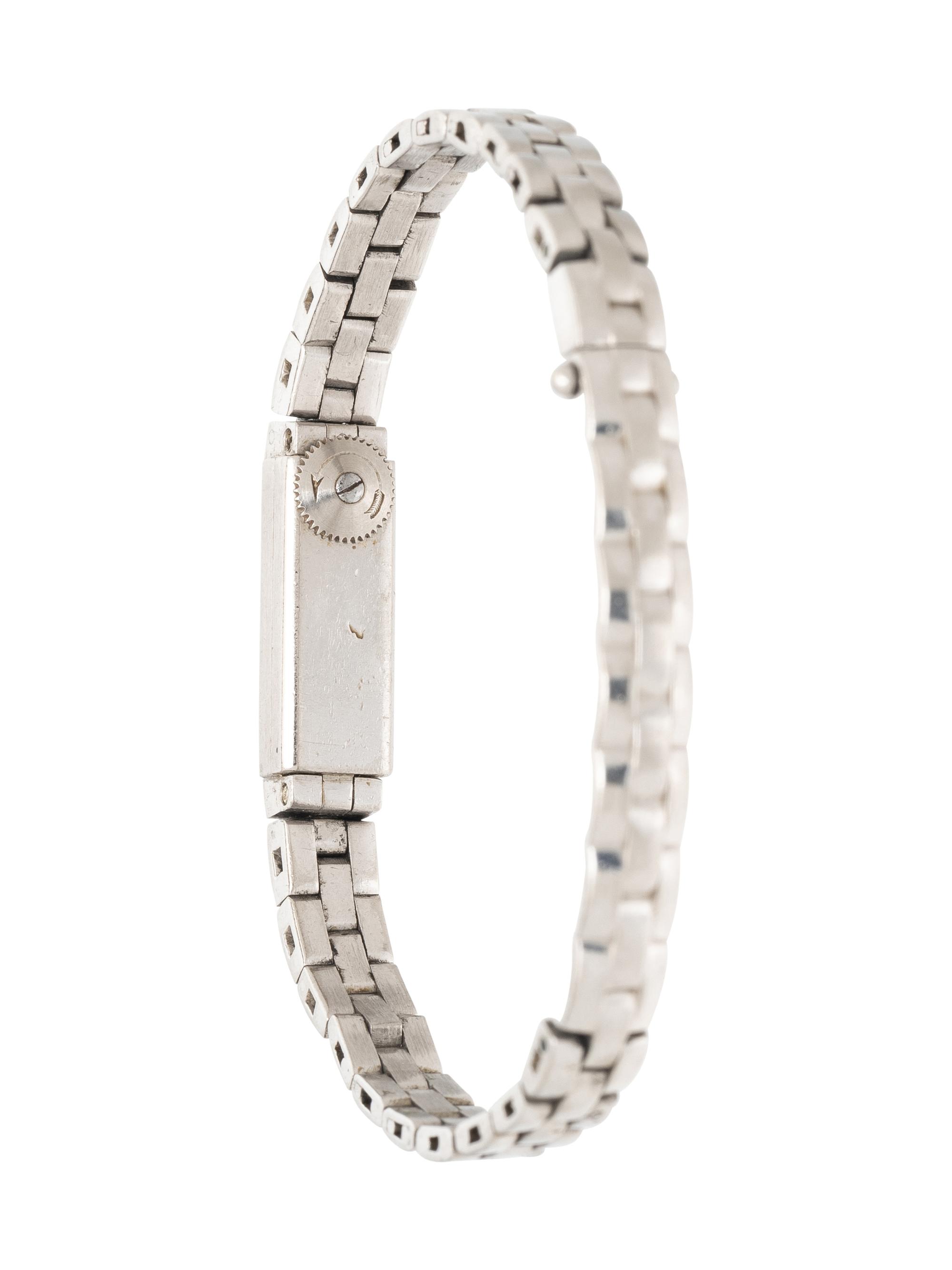 CARTIER, PLATINUM AND WHITE GOLD MINI WATCH