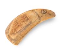 A Scrimshaw Whale's Tooth