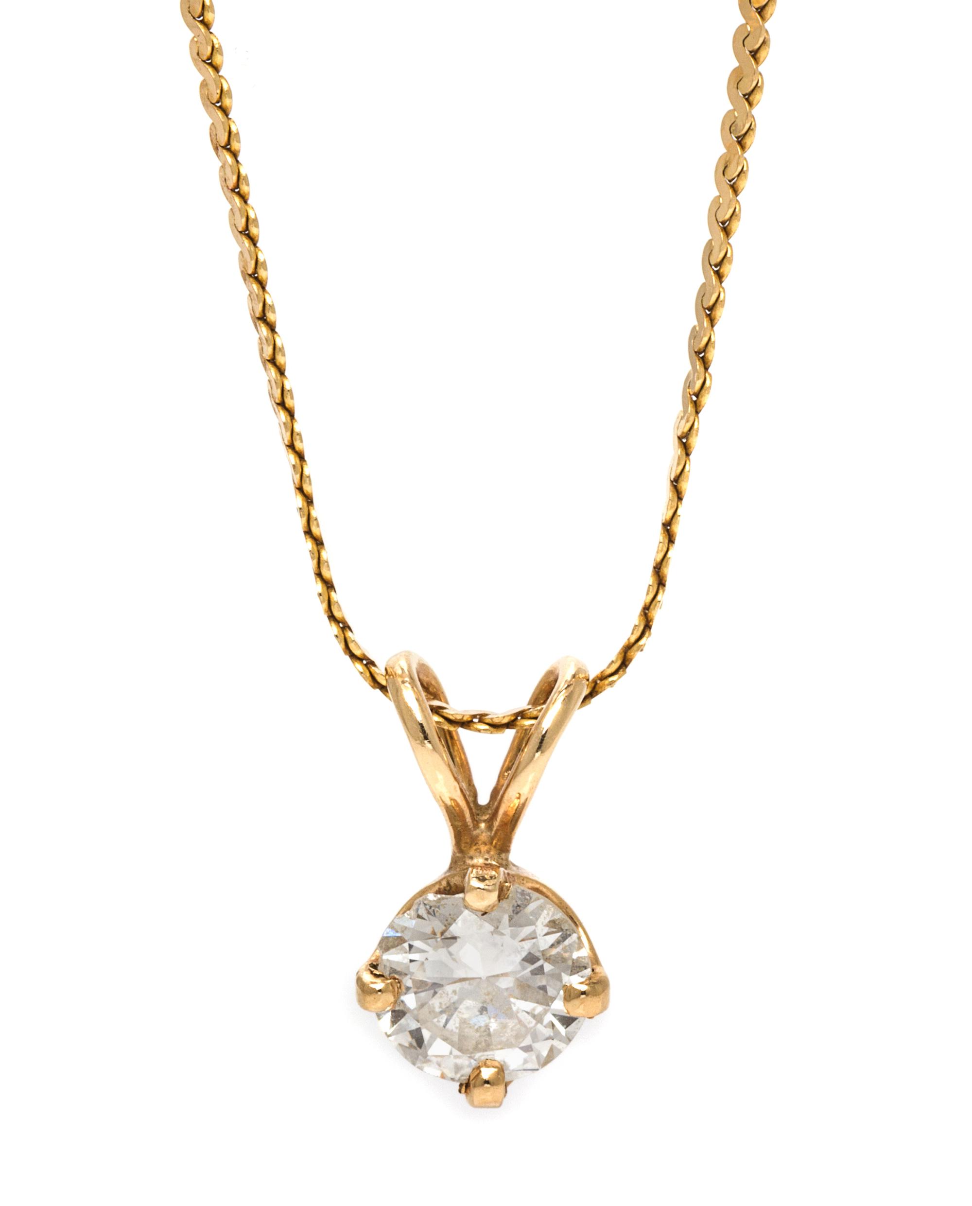 A Yellow Gold and Diamond Solitaire Pendant, 3.30 dwts.