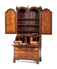 A Queen Anne Walnut Double Bonnet Secretary Bookcase
