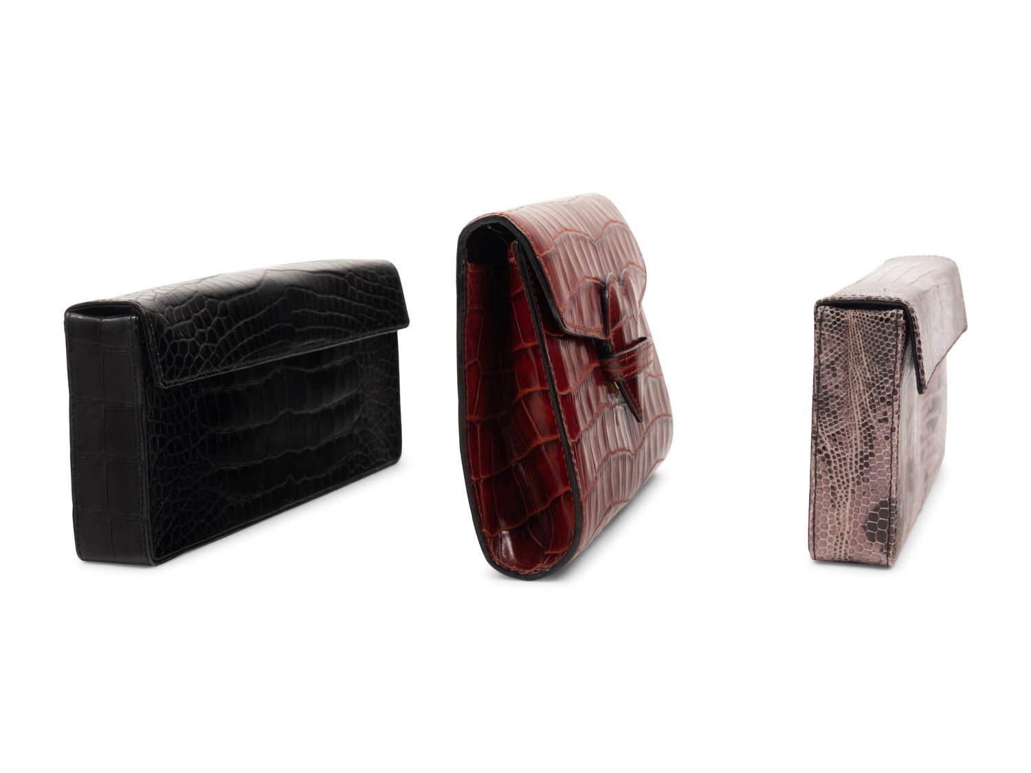 Three Designer Leather Clutches: Two Prada, One Rena Lange