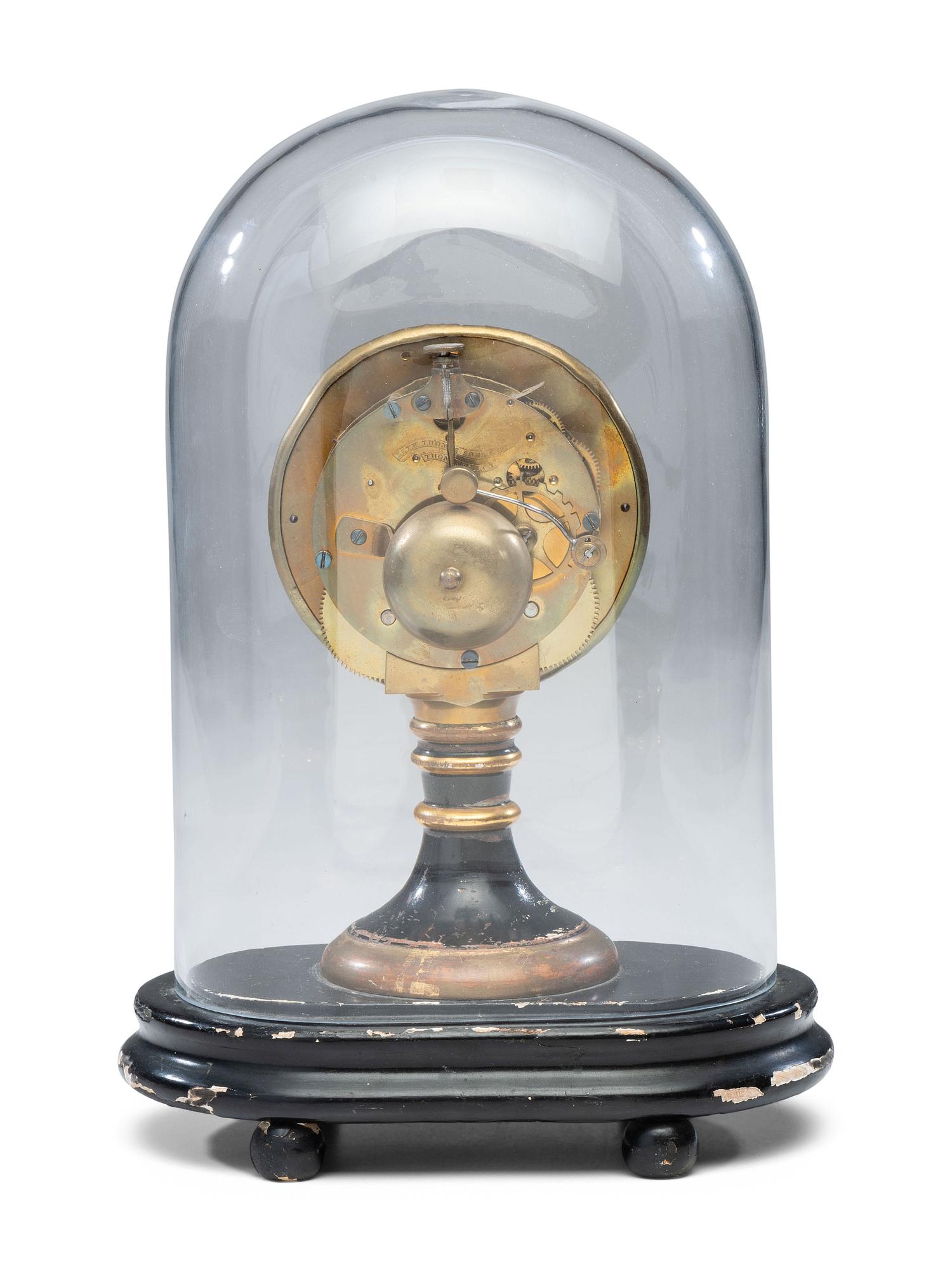 An Ebonized and Parcel Gilt Mantel Clock