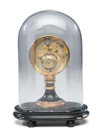 An Ebonized and Parcel Gilt Mantel Clock