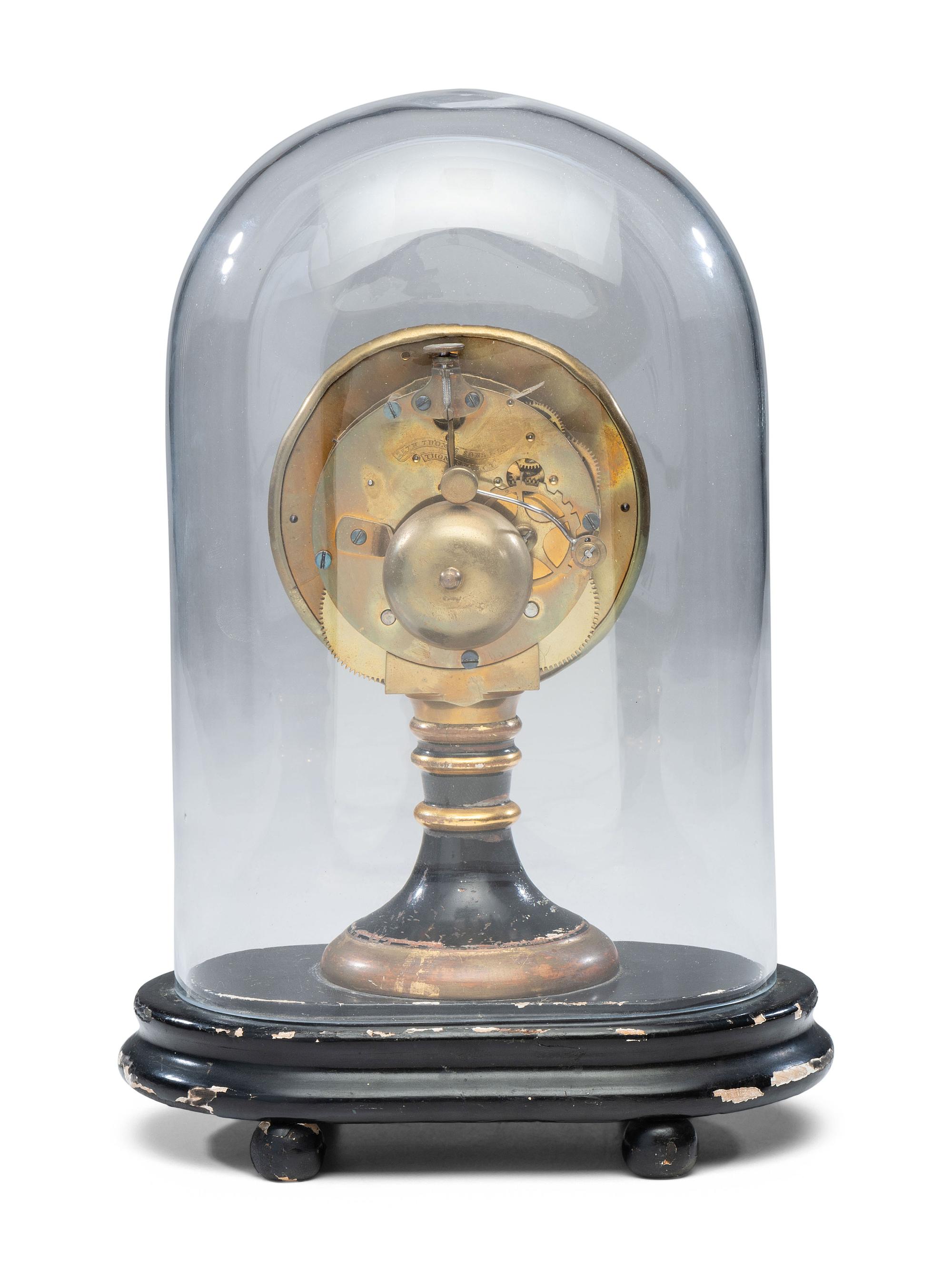 An Ebonized and Parcel Gilt Mantel Clock