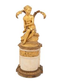 A Continental Gilt Bronze and Marble Figural Ornament
