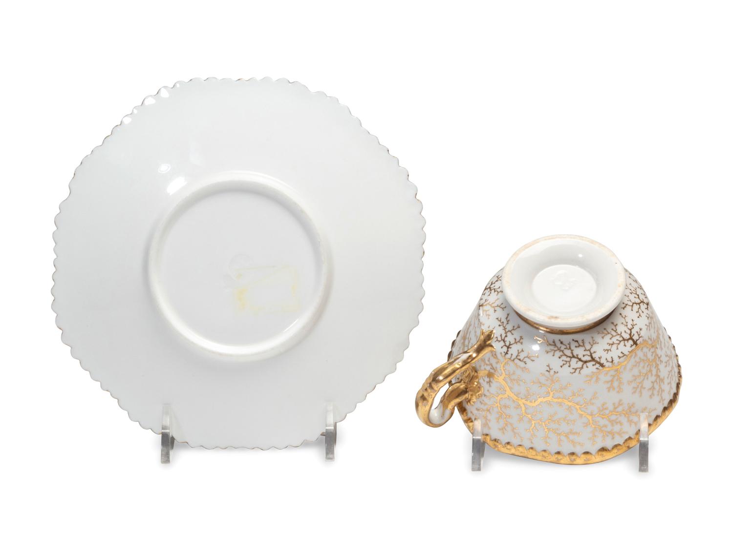 A Worcester Porcelain 'Shell-Encrusted' Basket, Cup and Saucer