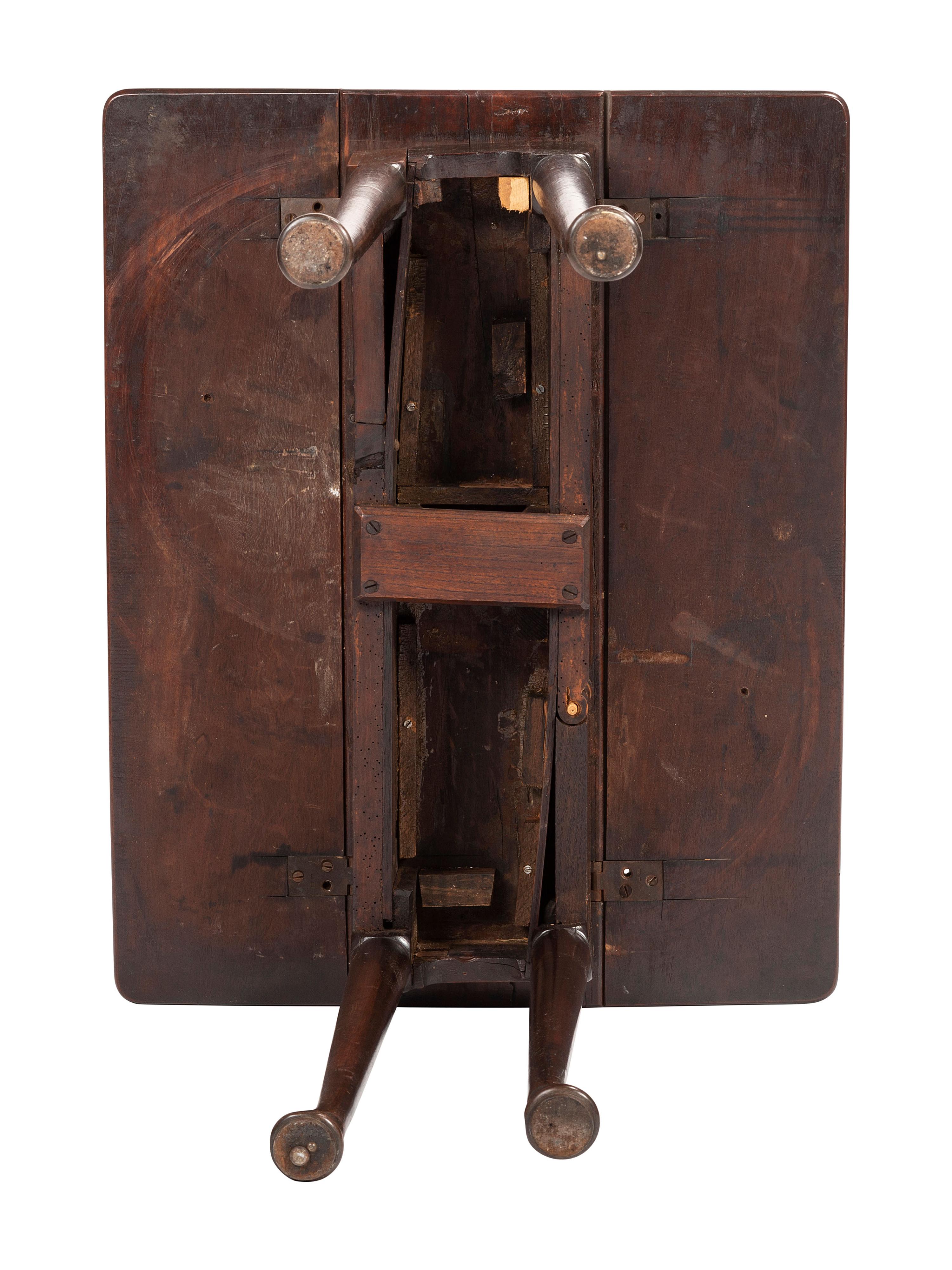 A George III Mahogany Drop Leaf Table