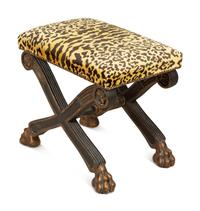 An Italian Neoclassical X-form Parcel Gilt Stool with Leopard Print Upholstered Seat