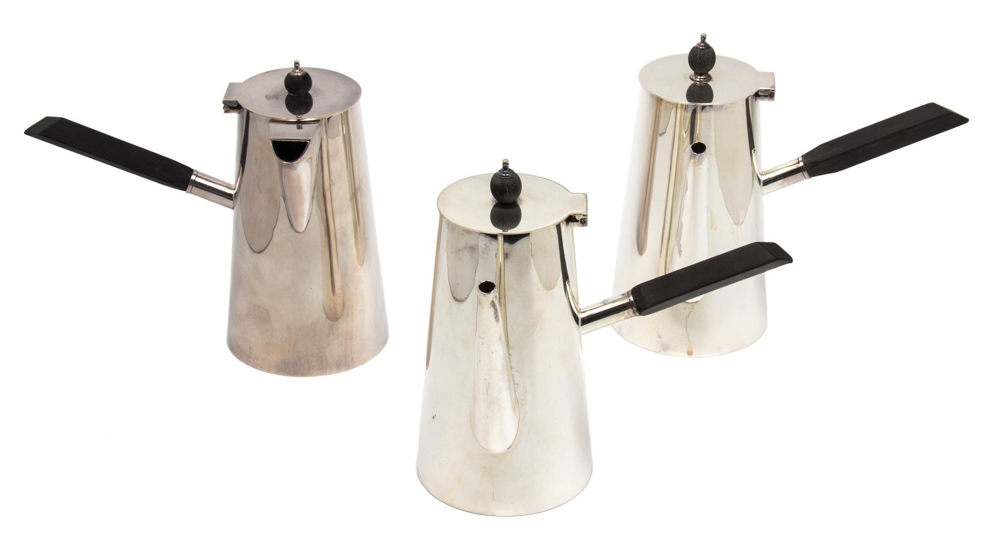 Three English Silverplate Coffee Pots, A & C. Co., Asprey, London,, having ebonized treen handles and finials.