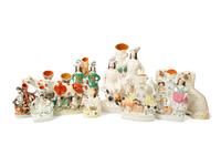 A Collection of Eight Staffordshire Spill Vases and a Pair of Seated Spaniels — 19TH CENTURY