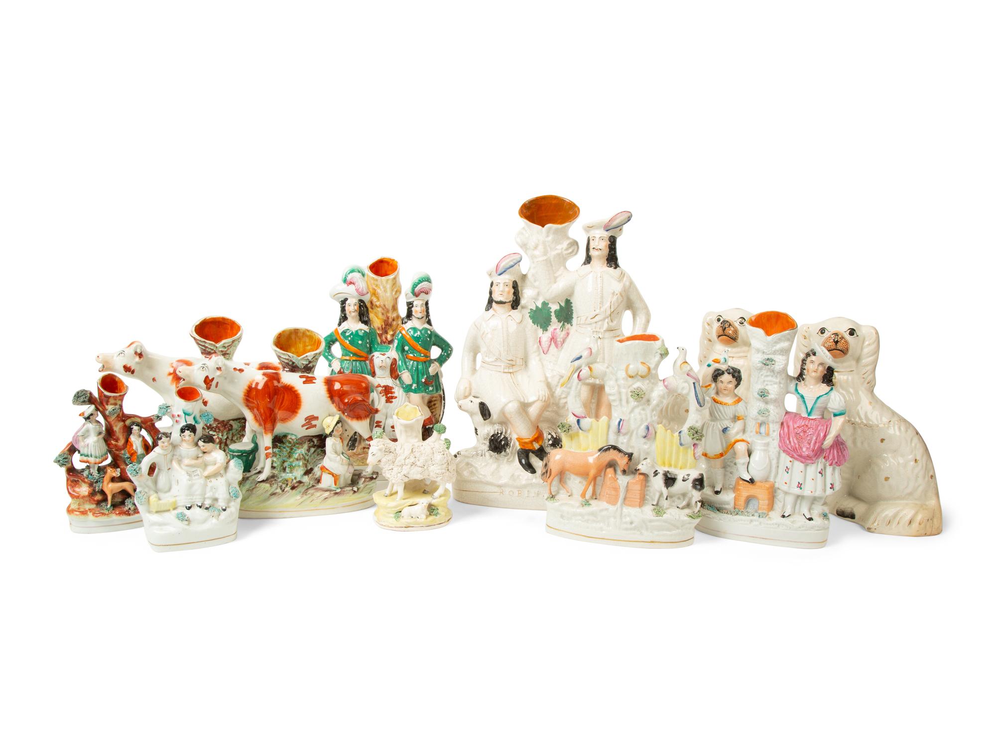 A Collection of Eight Staffordshire Spill Vases and a Pair of Seated Spaniels — 19TH CENTURY