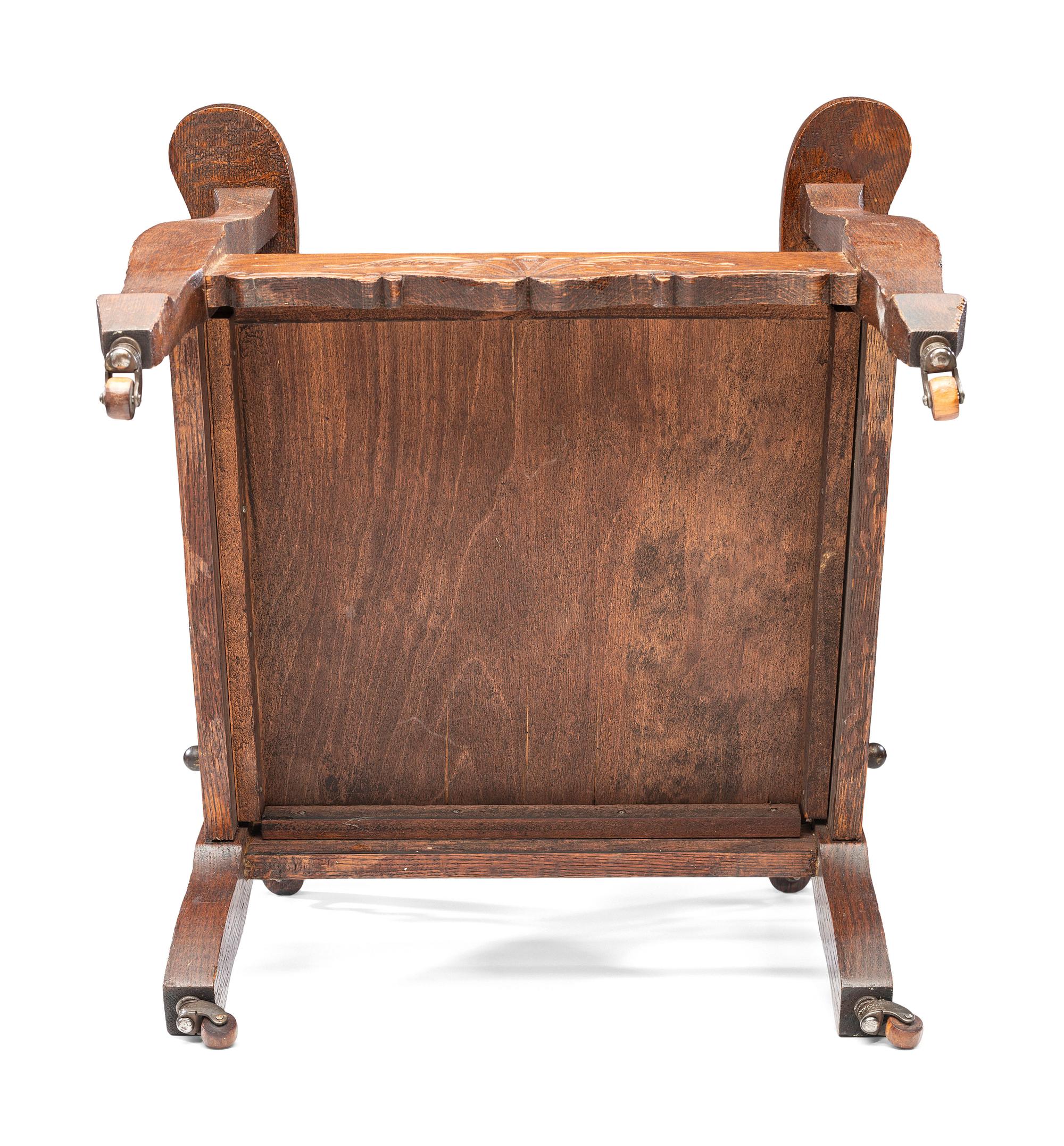 A Victorian Carved Mahogany and Tufted Velvet Upholstered Child's Reclining Armchair