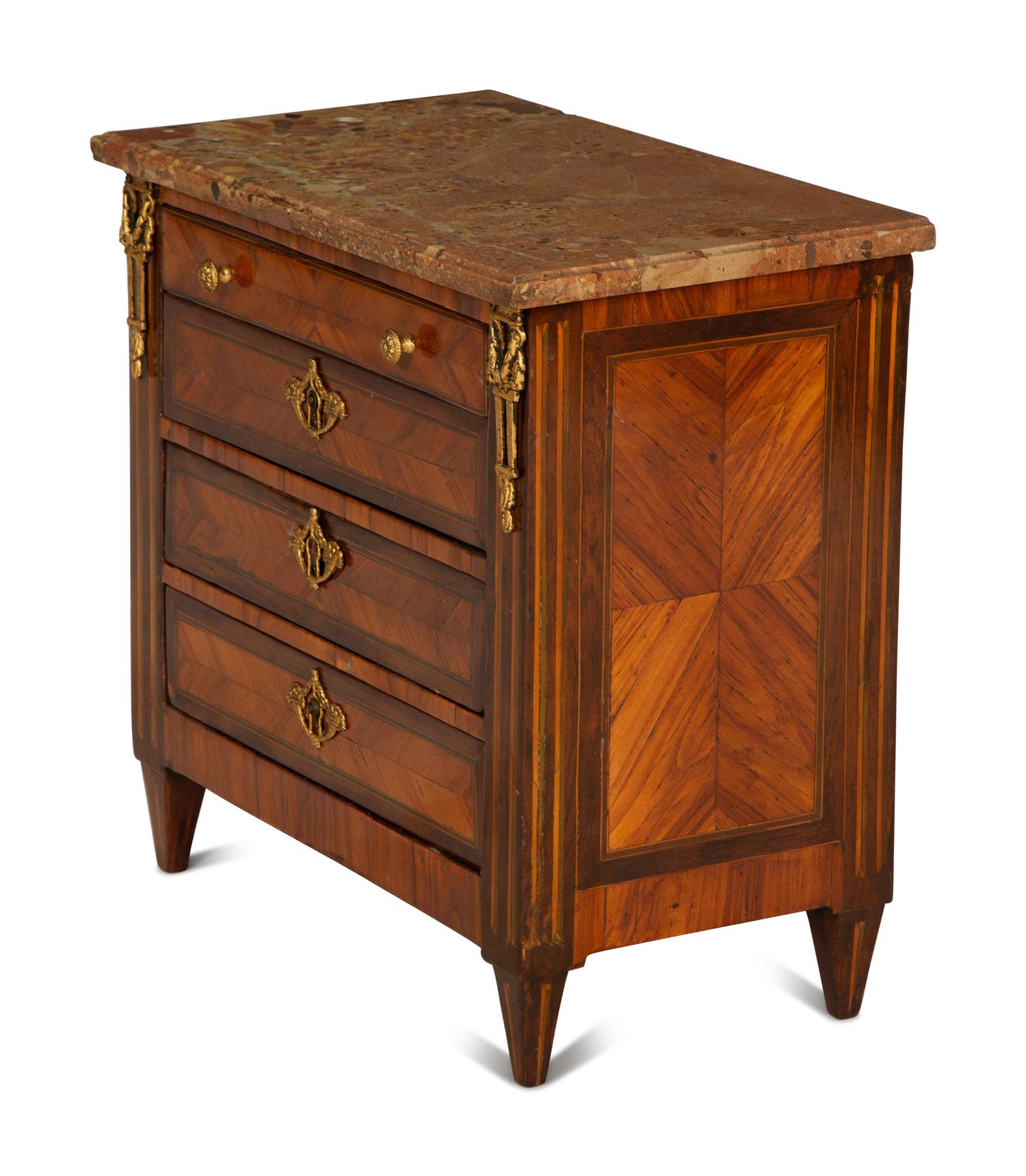 A Louis XVI Diminutive Marble-Top Four Drawer Chiffonier