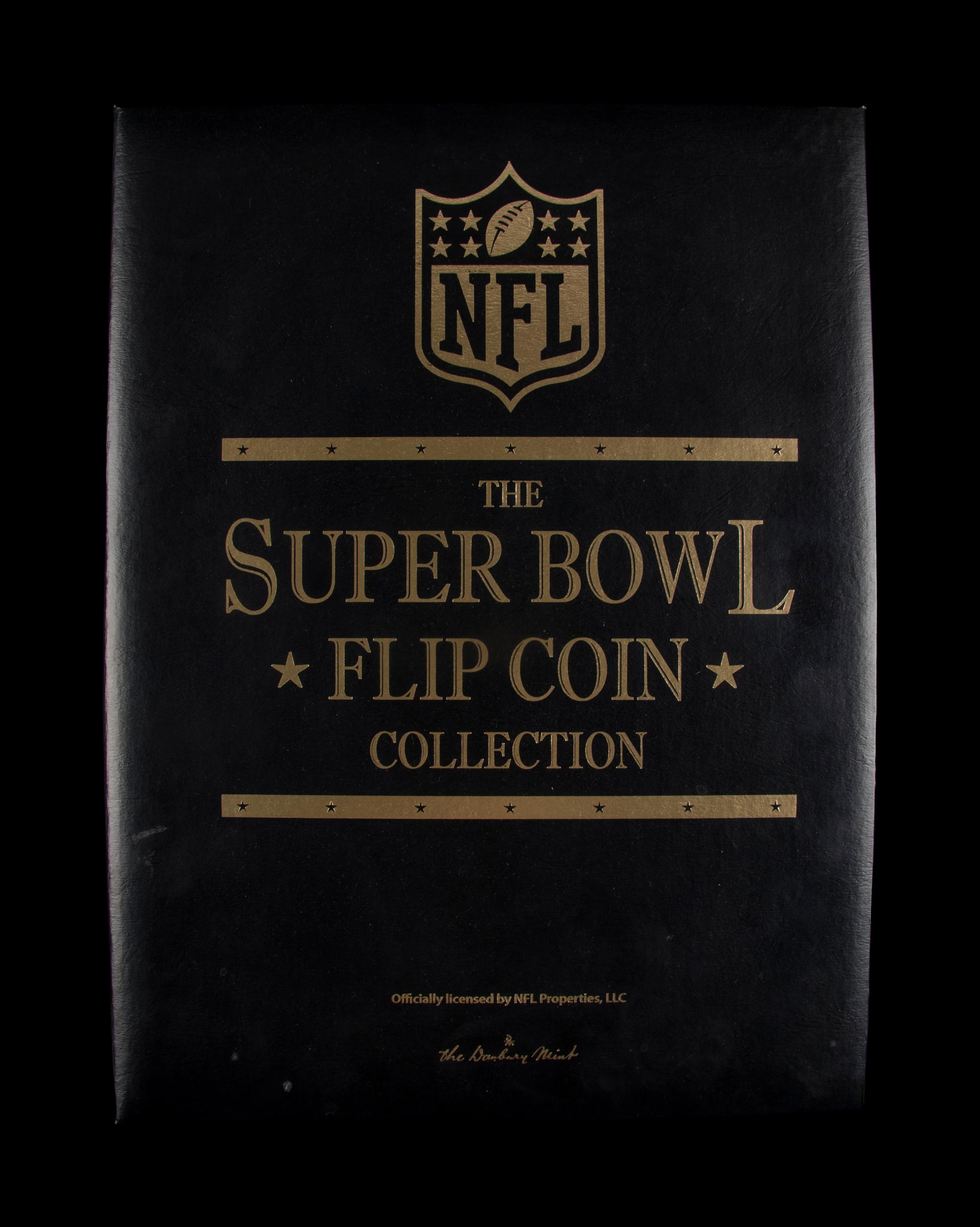 A Danbury Mint Super Bowl NFL Flip Coin Collection Book