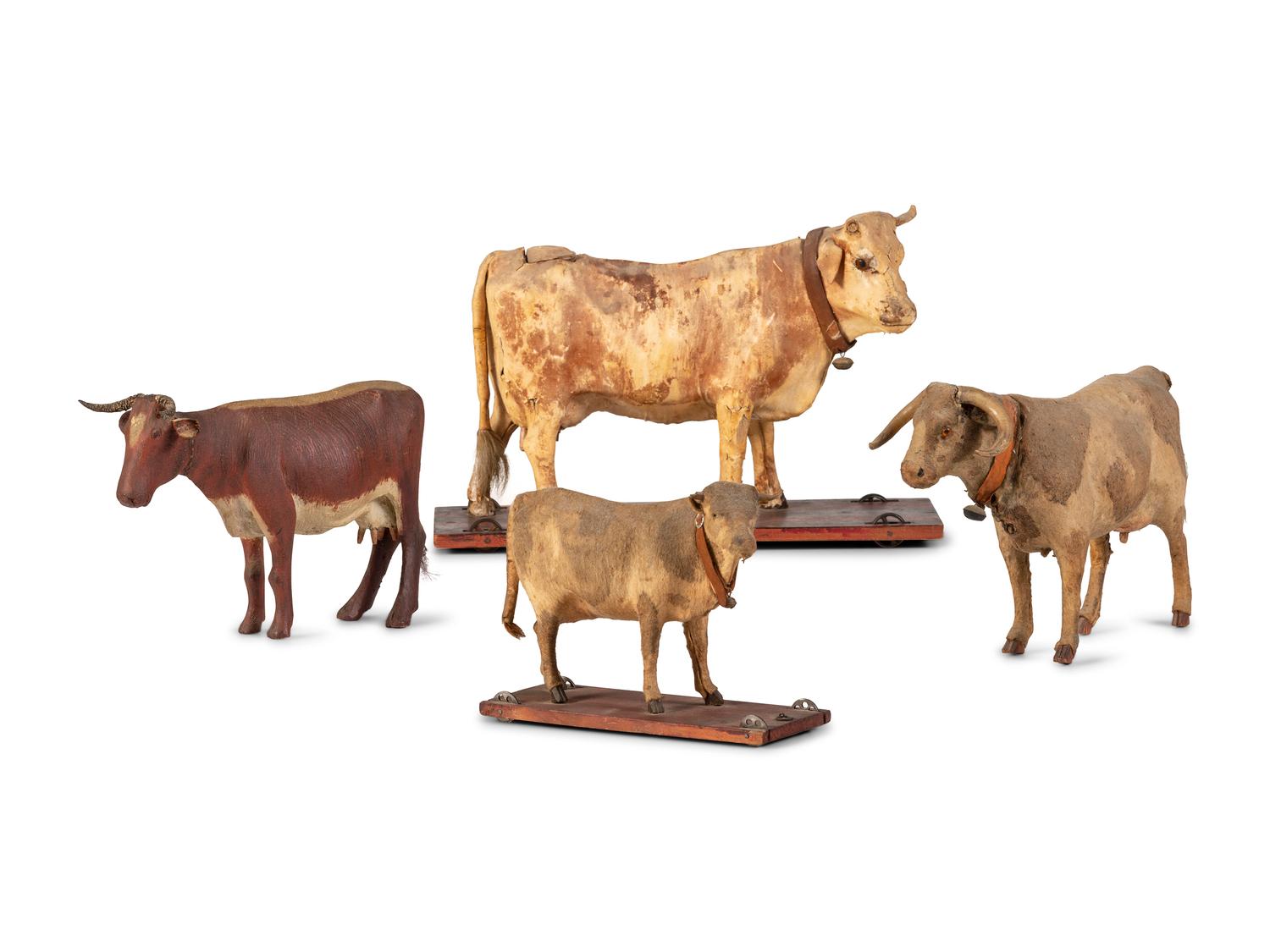 Four Cow Toys