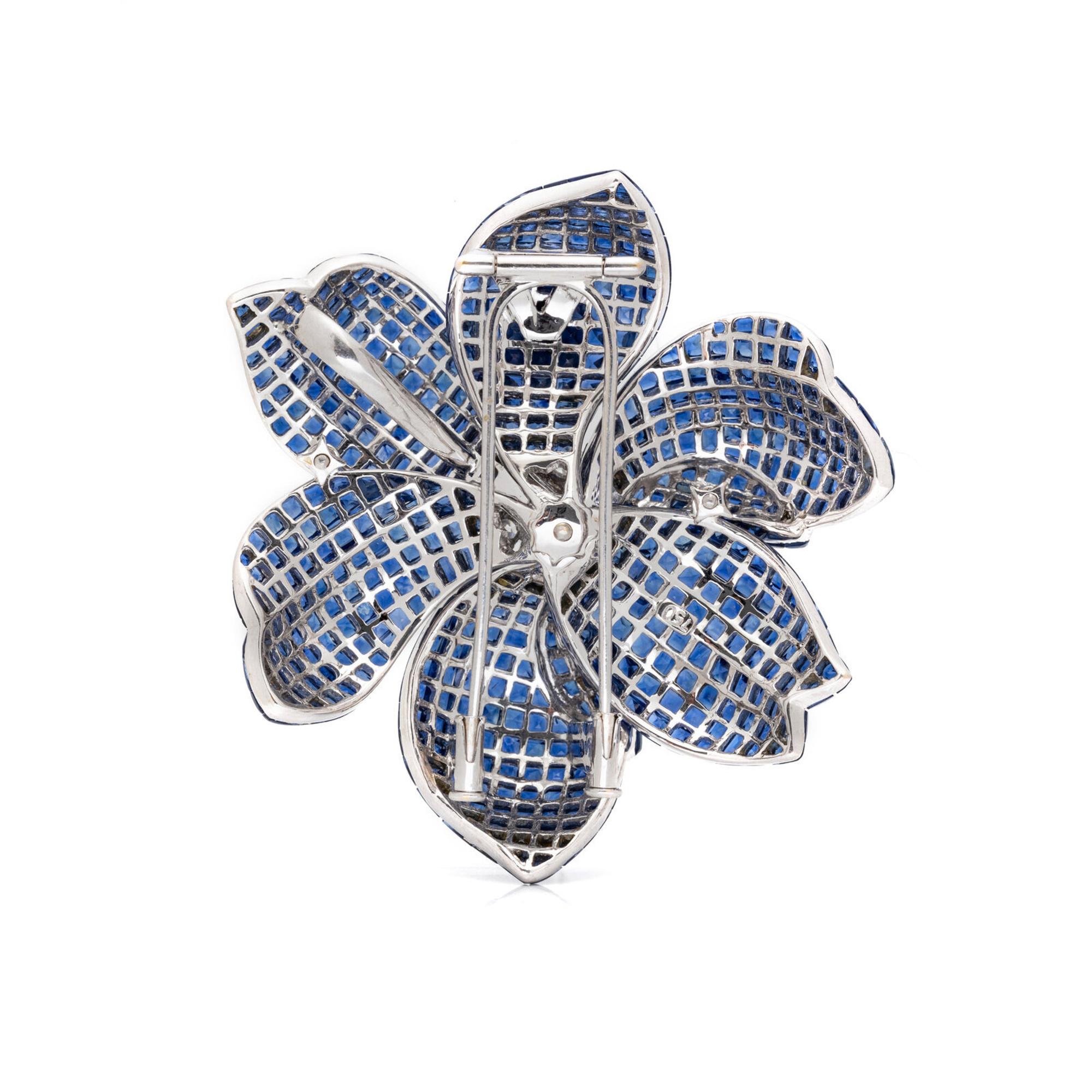WHITE GOLD, INVISIBLY-SET SAPPHIRE AND DIAMOND FLOWER PENDANT/BROOCH