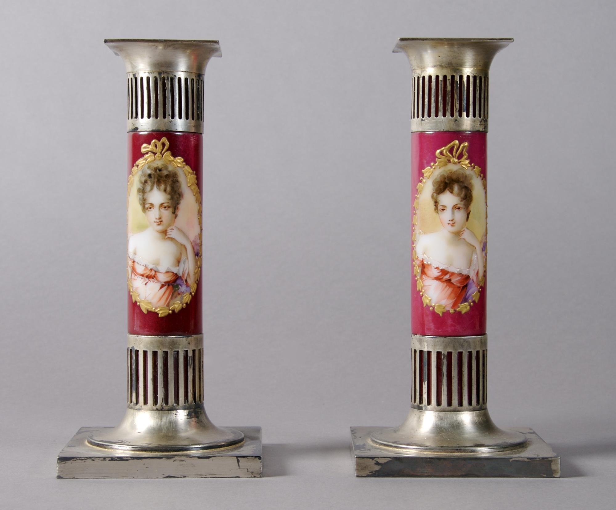 A Pair of Pairpoint Ceramic and Silvered Metal Candlesticks, Height 8 1/4 inches.
