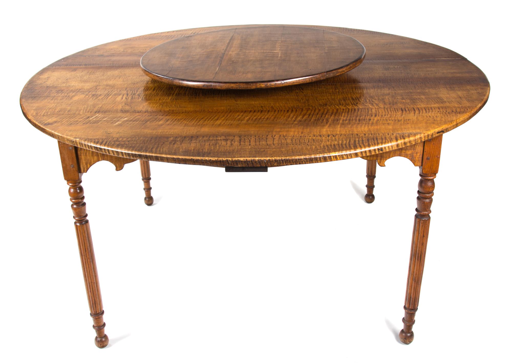An American Maple Lazy Susan Table Height 29 x diameter 60 inches. — 20TH CENTURY