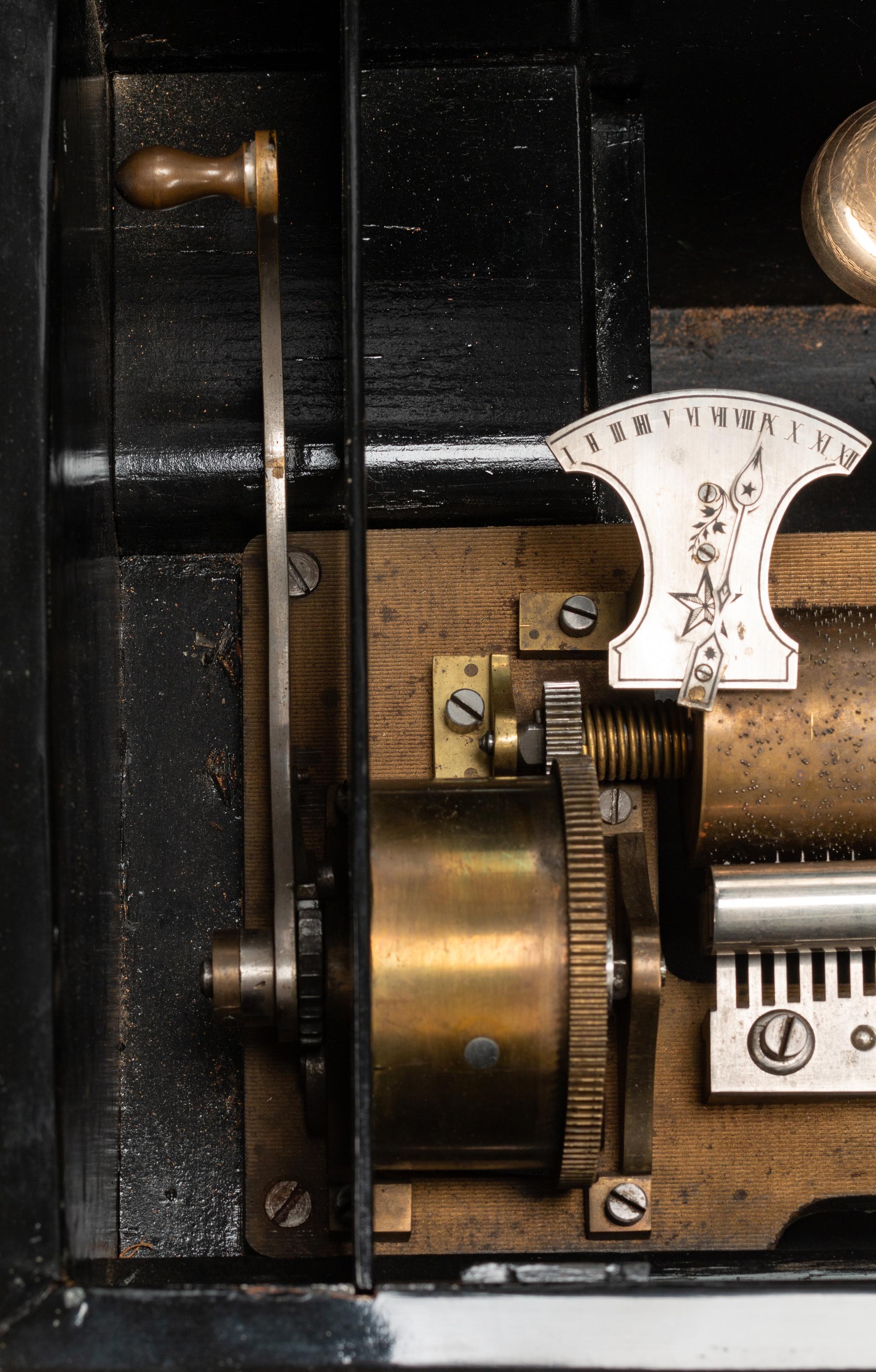 A Swiss Burlwood "Bells-in-Sight" Cylinder Music Box