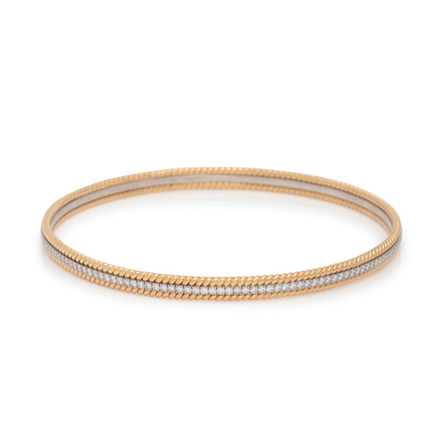 TIFFANY & CO., SCHLUMBERGER, YELLOW GOLD, PLATINUM AND DIAMOND 'ROPE' BANGLE BRACELET