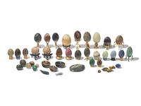 A Large Collection of Forty-Five Carved Stone and Semiprecious Eggs, Spheres, and Other Objects