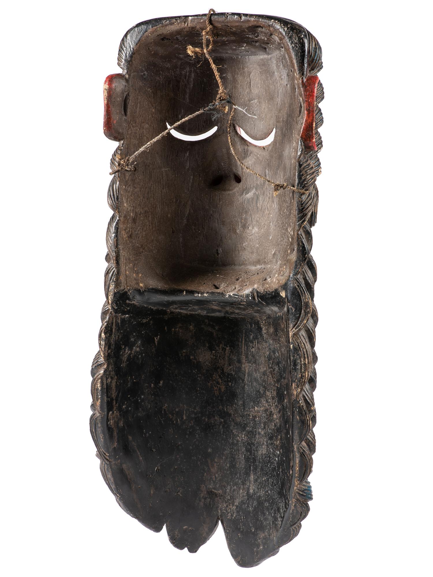 A Mexican Carved and Painted Wood Festival Mask