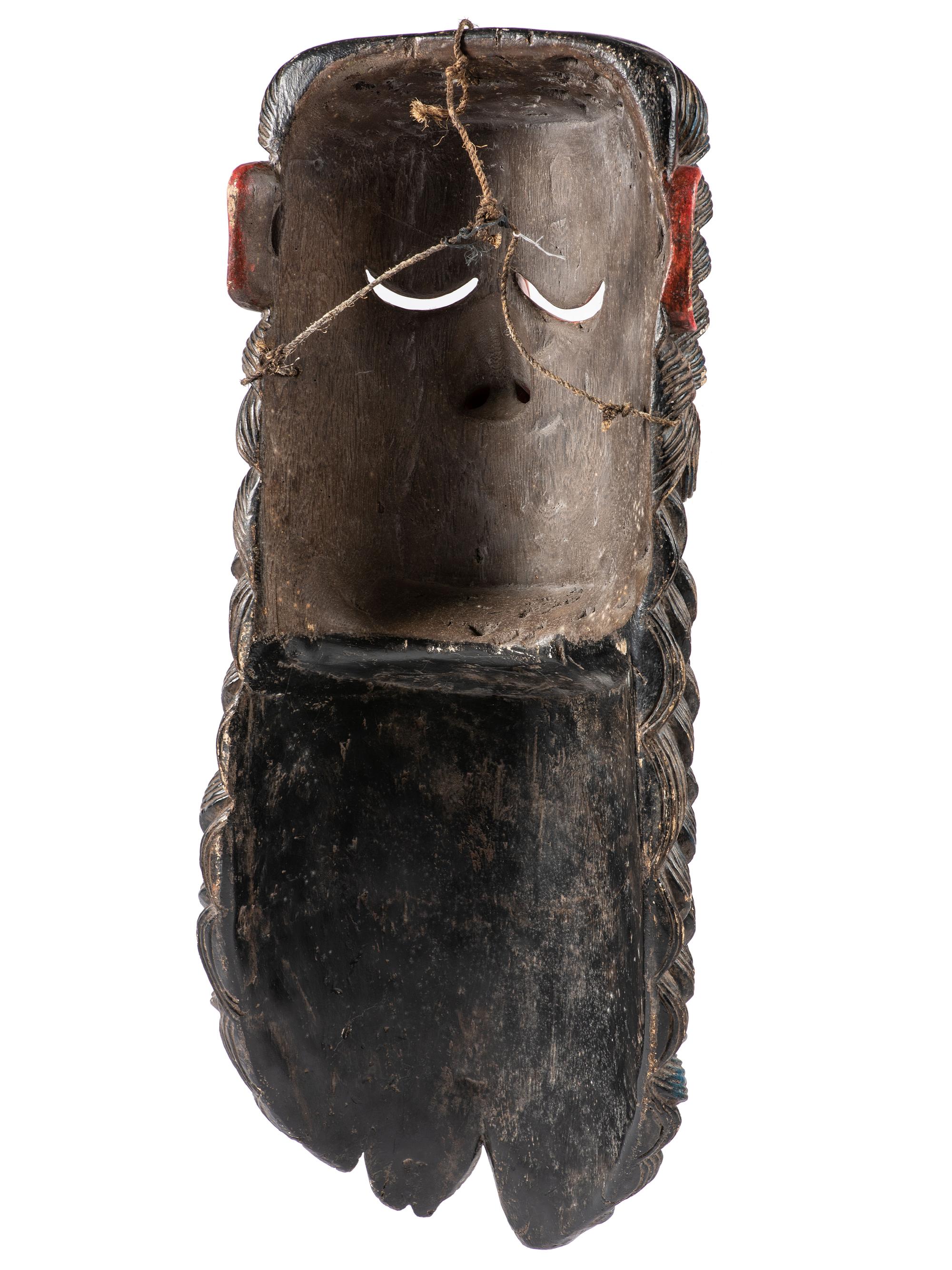 A Mexican Carved and Painted Wood Festival Mask