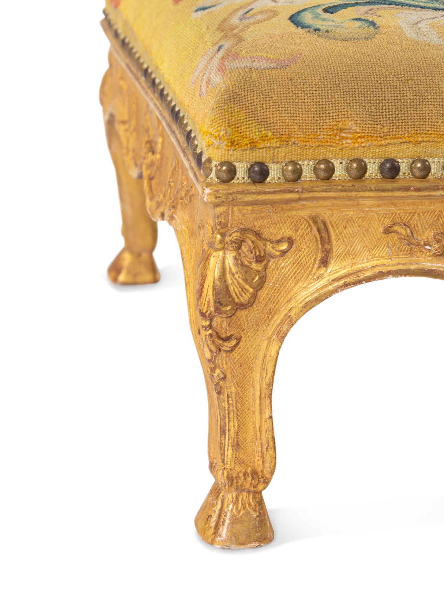 A Régence Needlepoint-Upholstered Giltwood Stool