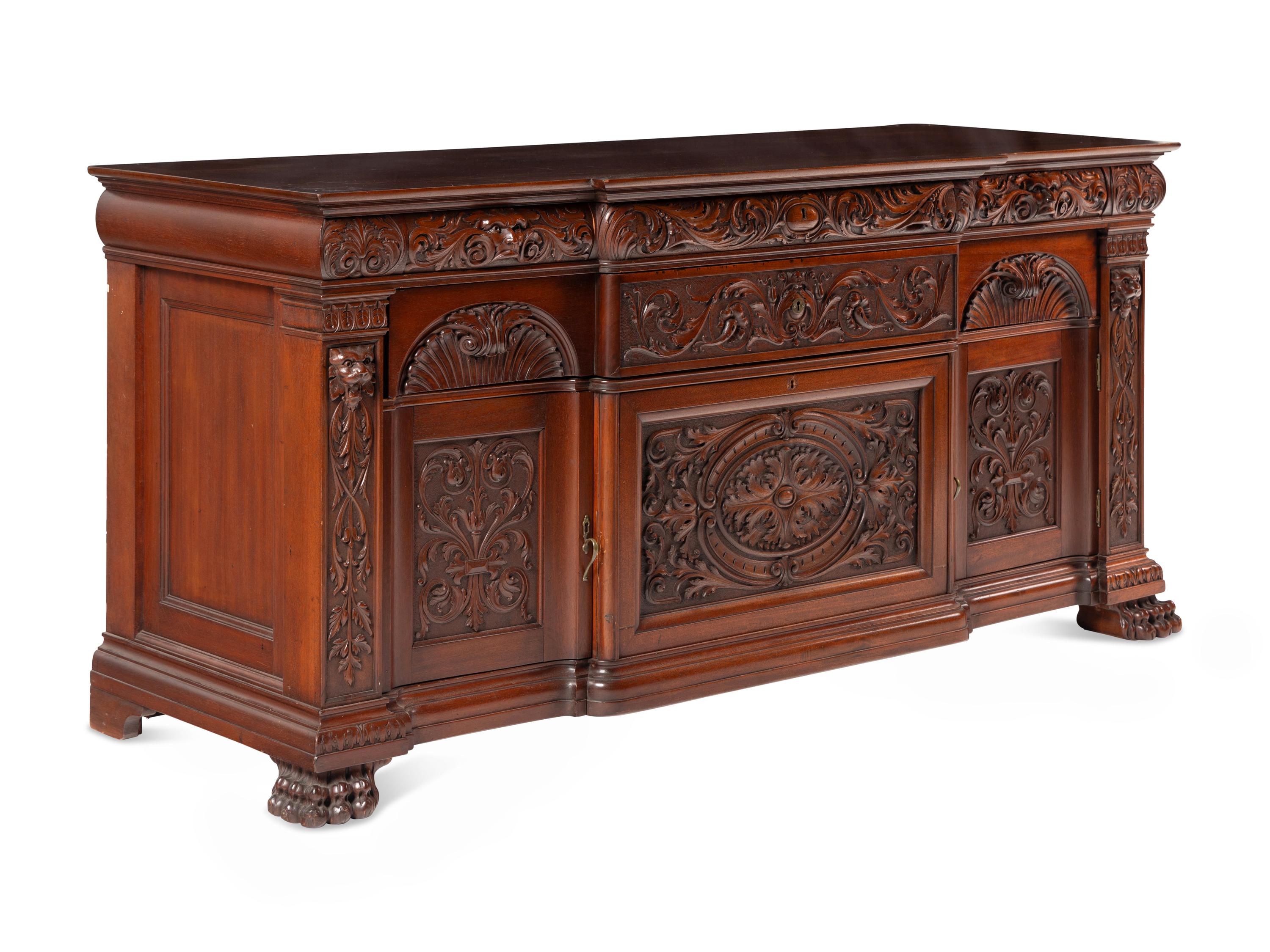 A Renaissance Revival Carved Mahogany Serving Cabinet