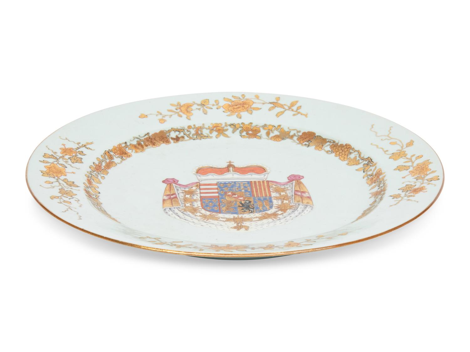 A Chinese Export Parcel-Gilt Armorial Porcelain Charger