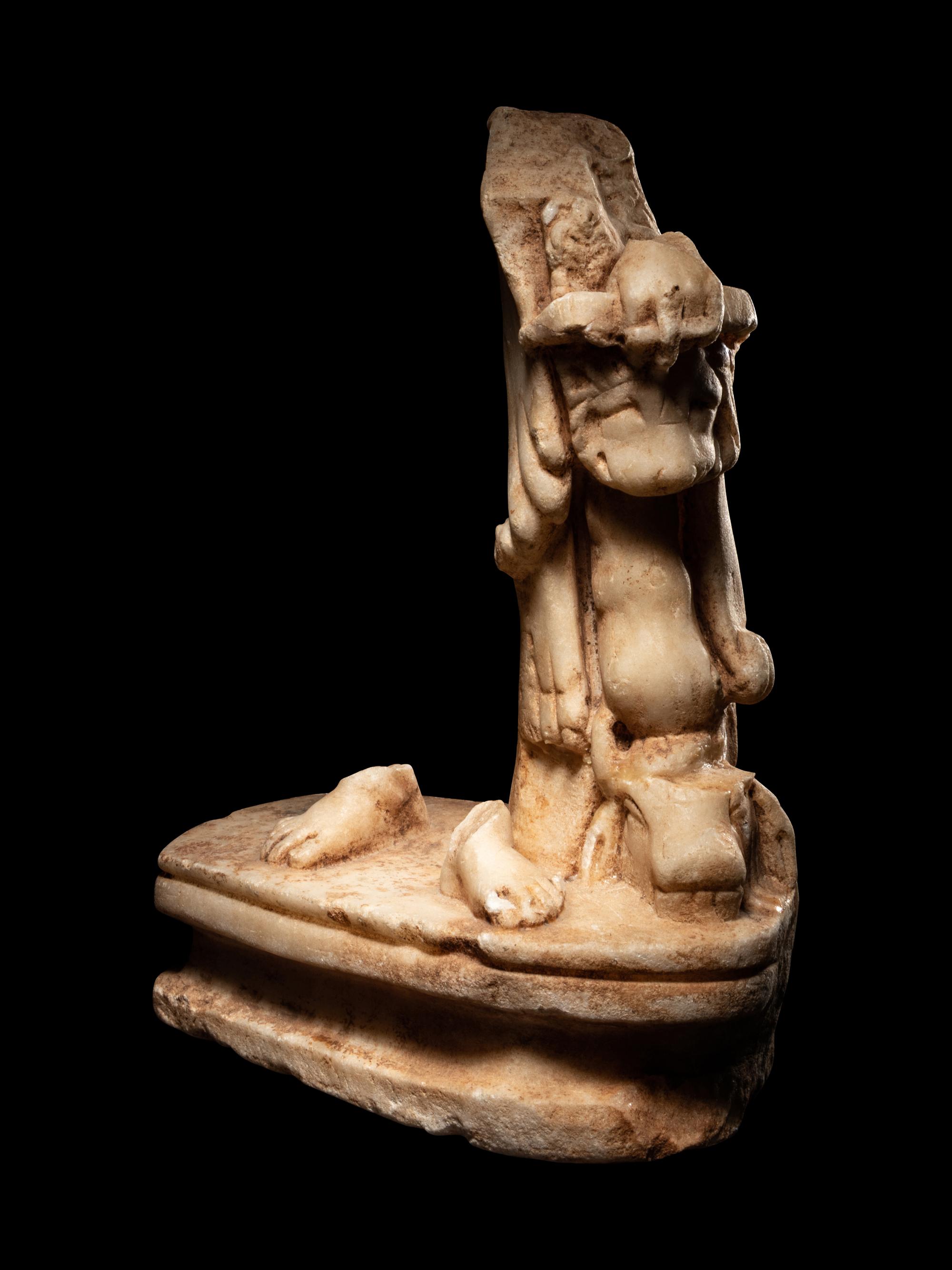 A Roman Marble Sculpture Base from a Statue of Hercules