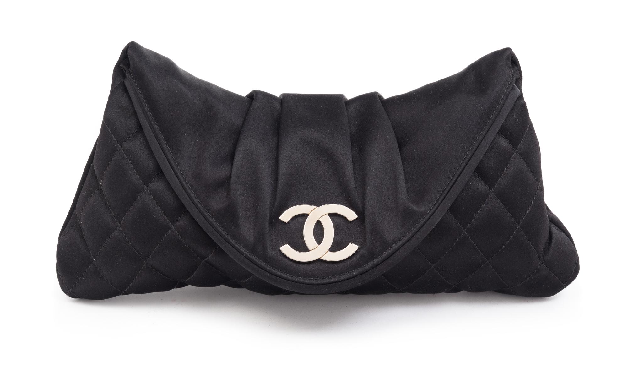 A Chanel Black Satin Partially Quilted Clutch, 11.5" x 5" x .5".
