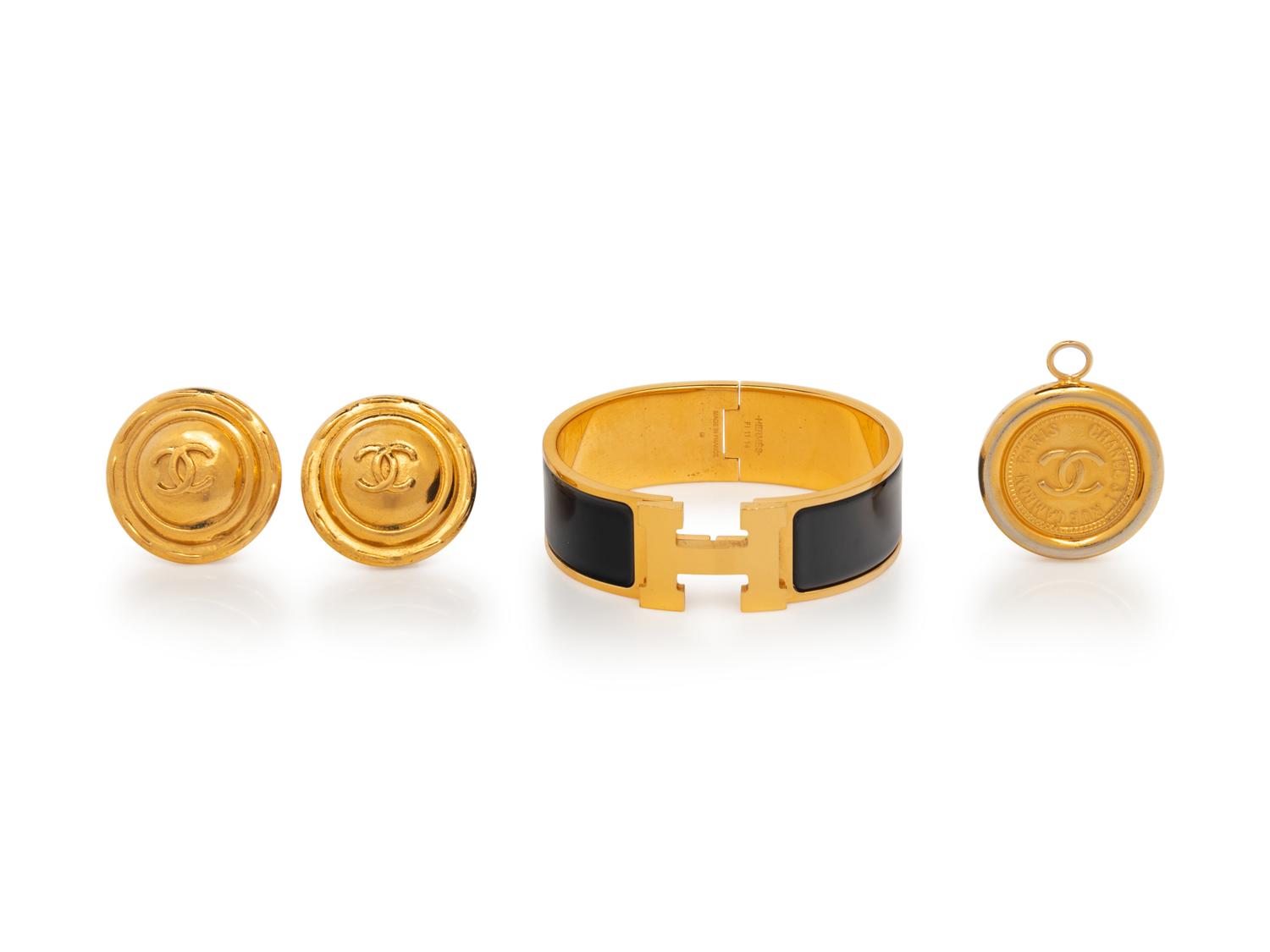 A Group of Three Costume Jewelry Pieces by Hermès and Chanel