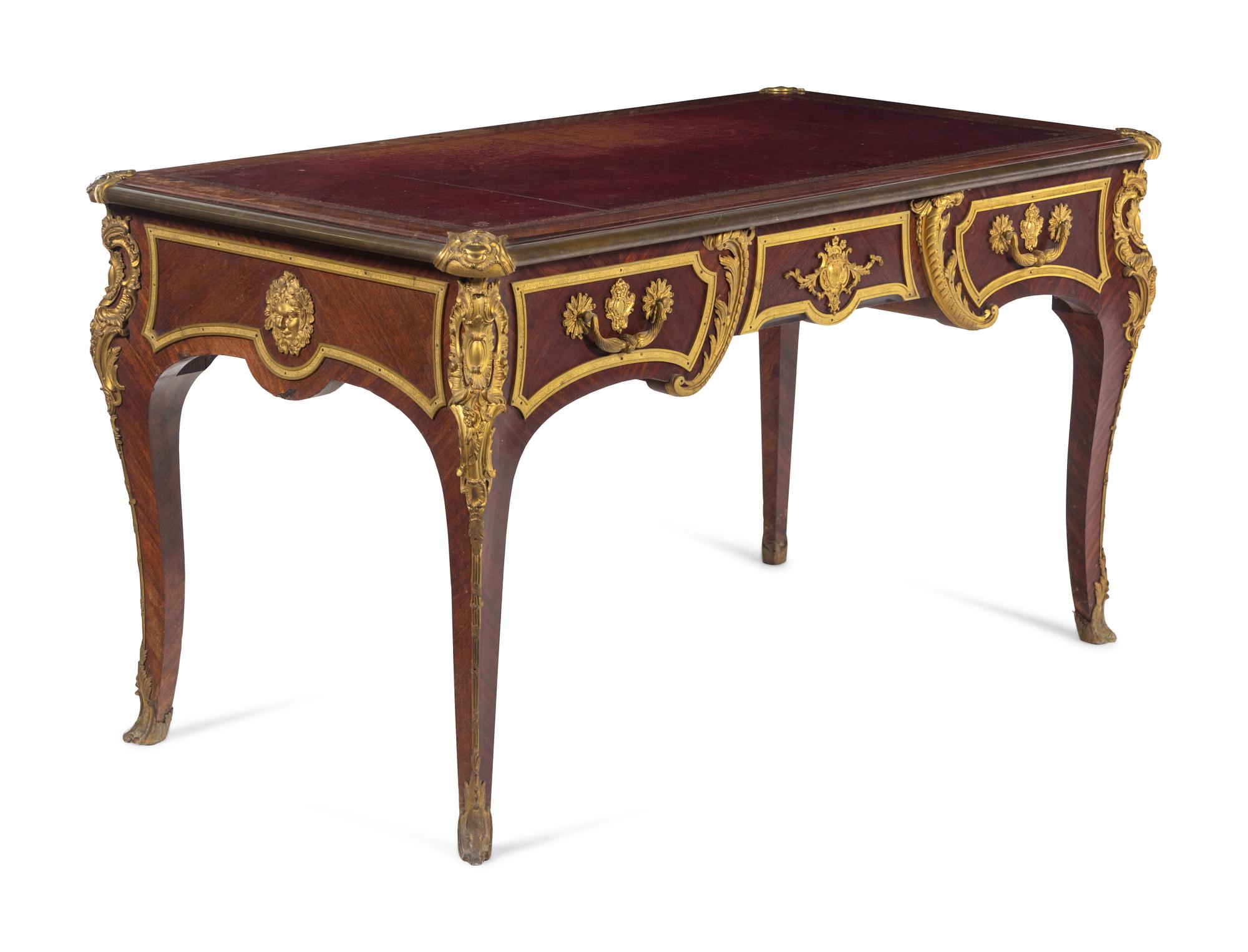 A Louis XV Style Gilt Bronze Mounted Kingwood Bureau Plat
