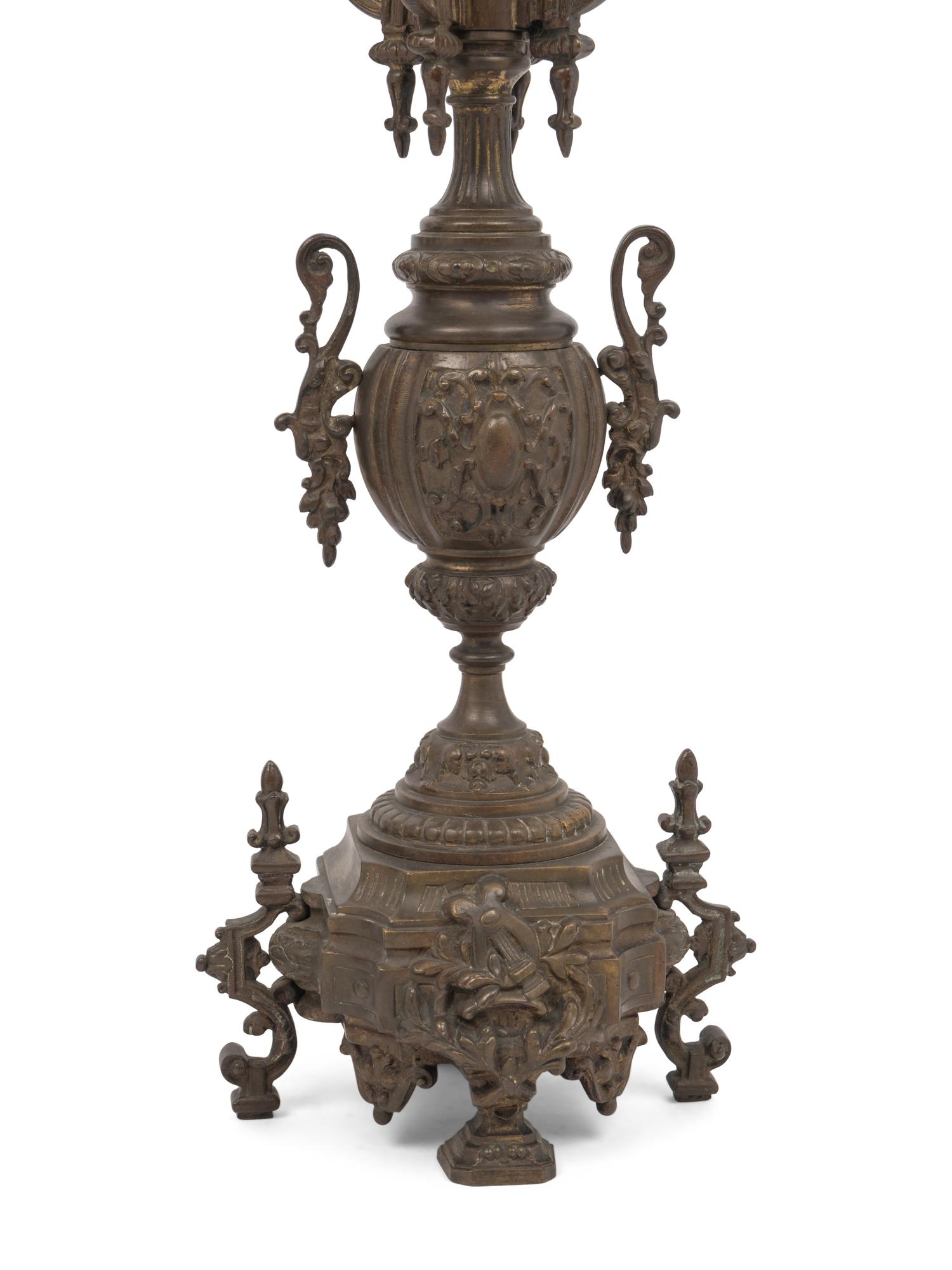 A Pair of French Neoclassical Bronze Four-Light Candelabra
