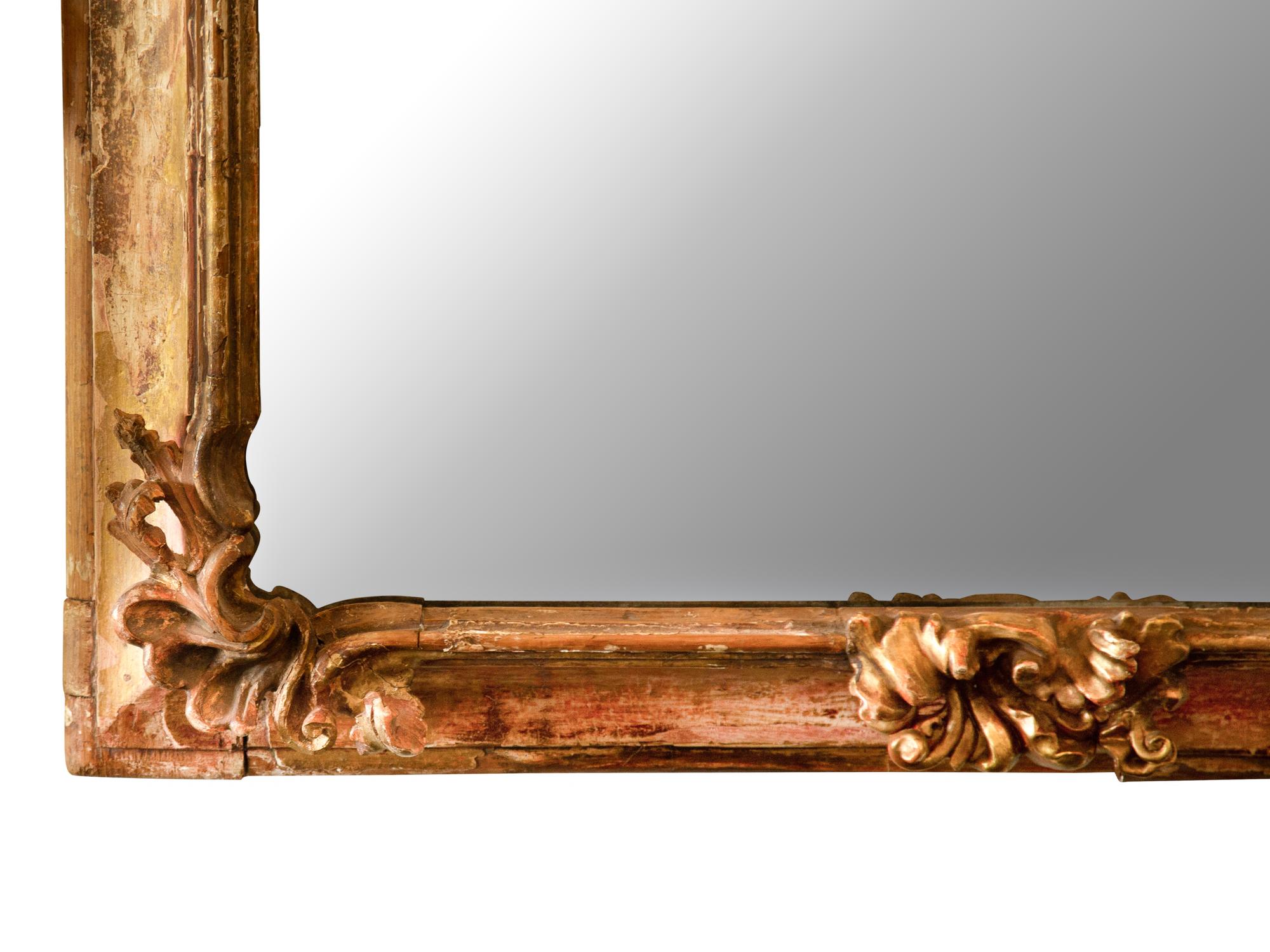 An Italian Baroque Style Painted and Parcel Gilt Mirror