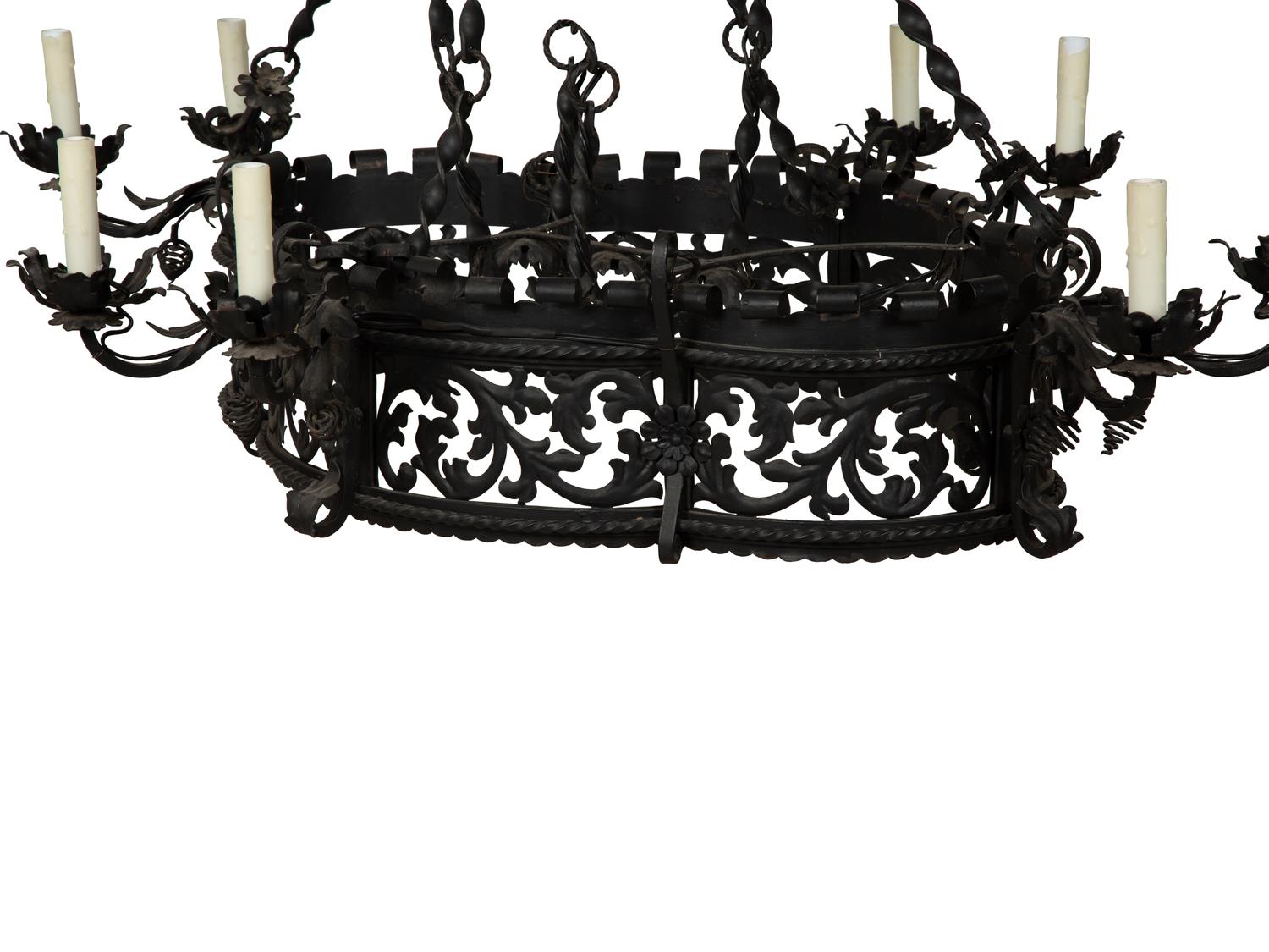 A Wrought Iron Chandelier in the Style of Addison Mizner — 20th Century