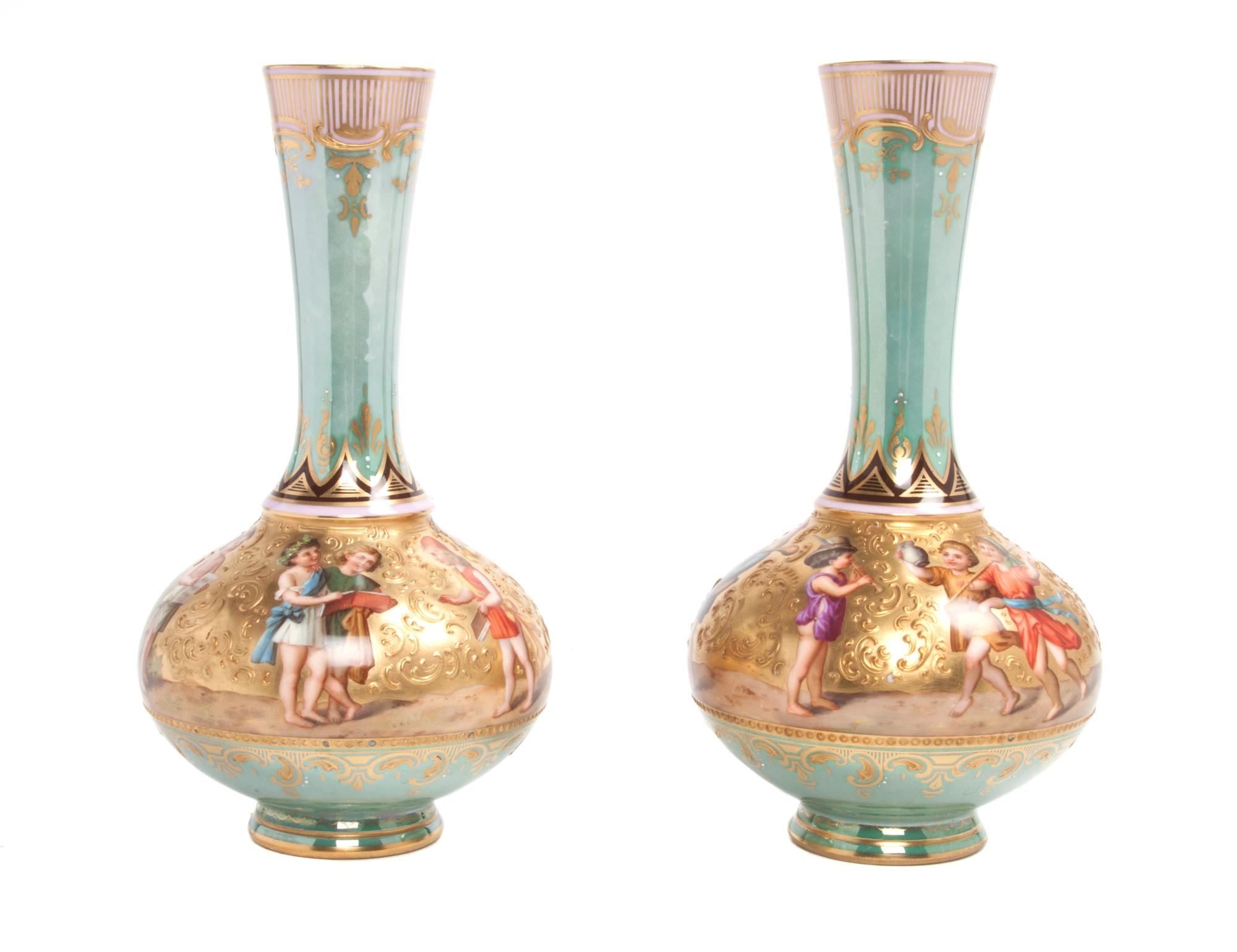 A Pair of Royal Vienna Style Porcelain Vases Height 7 3/4 inches.