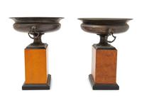 A Pair of Grand Tour Style Cast Metal Urns on Plinths
