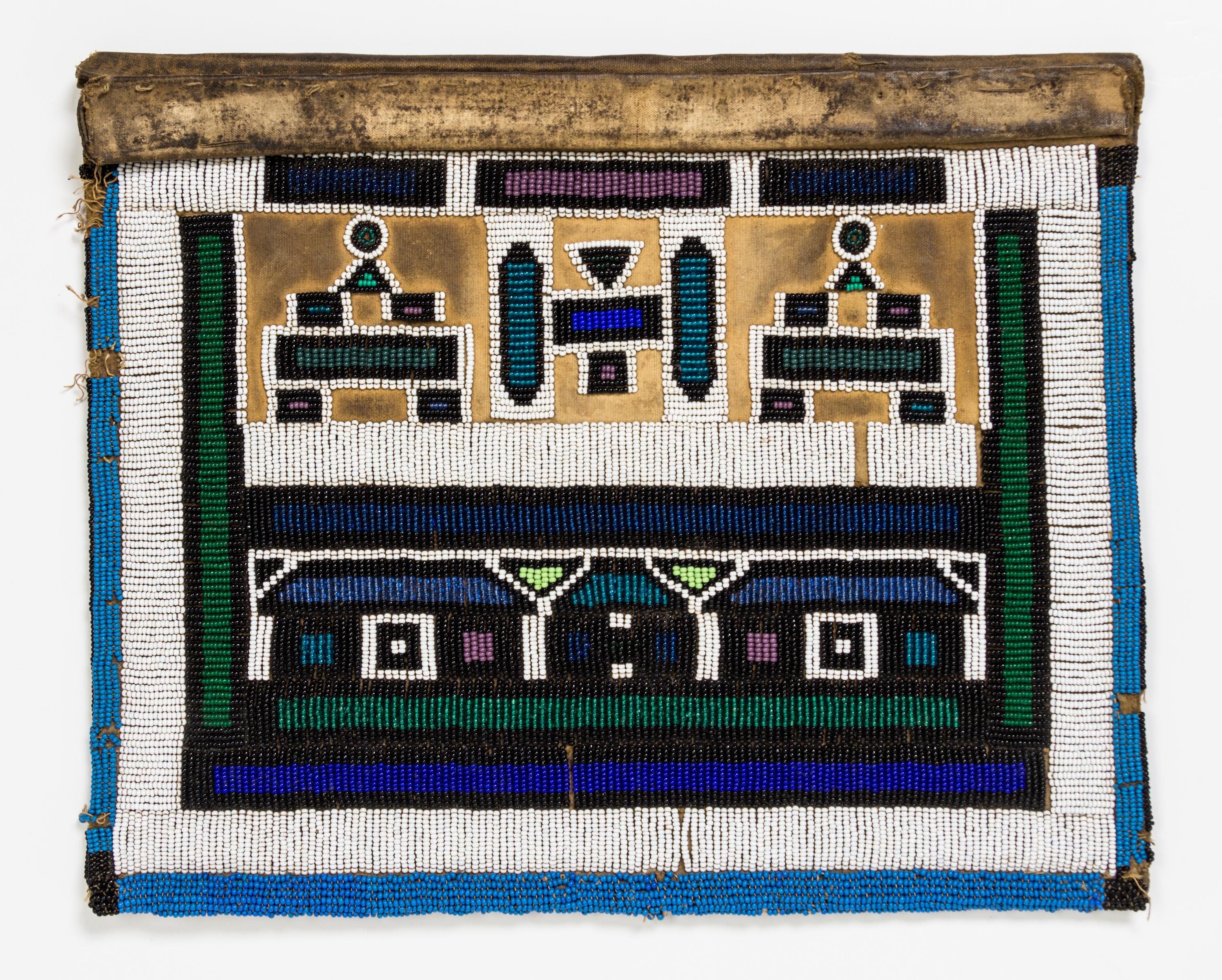 A Group of Four African Beaded Aprons Height of largest 21 1/2 x width 20 1/4 inches.