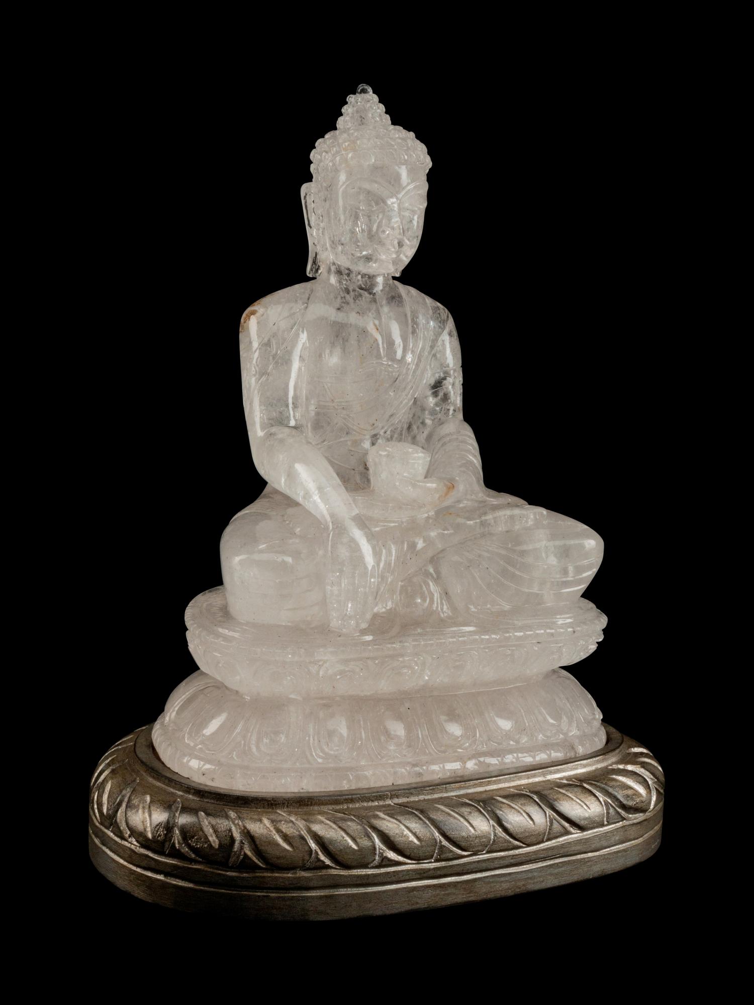 A Chinese Carved Rock Crystal Figure of Buddha