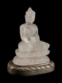 A Chinese Carved Rock Crystal Figure of Buddha