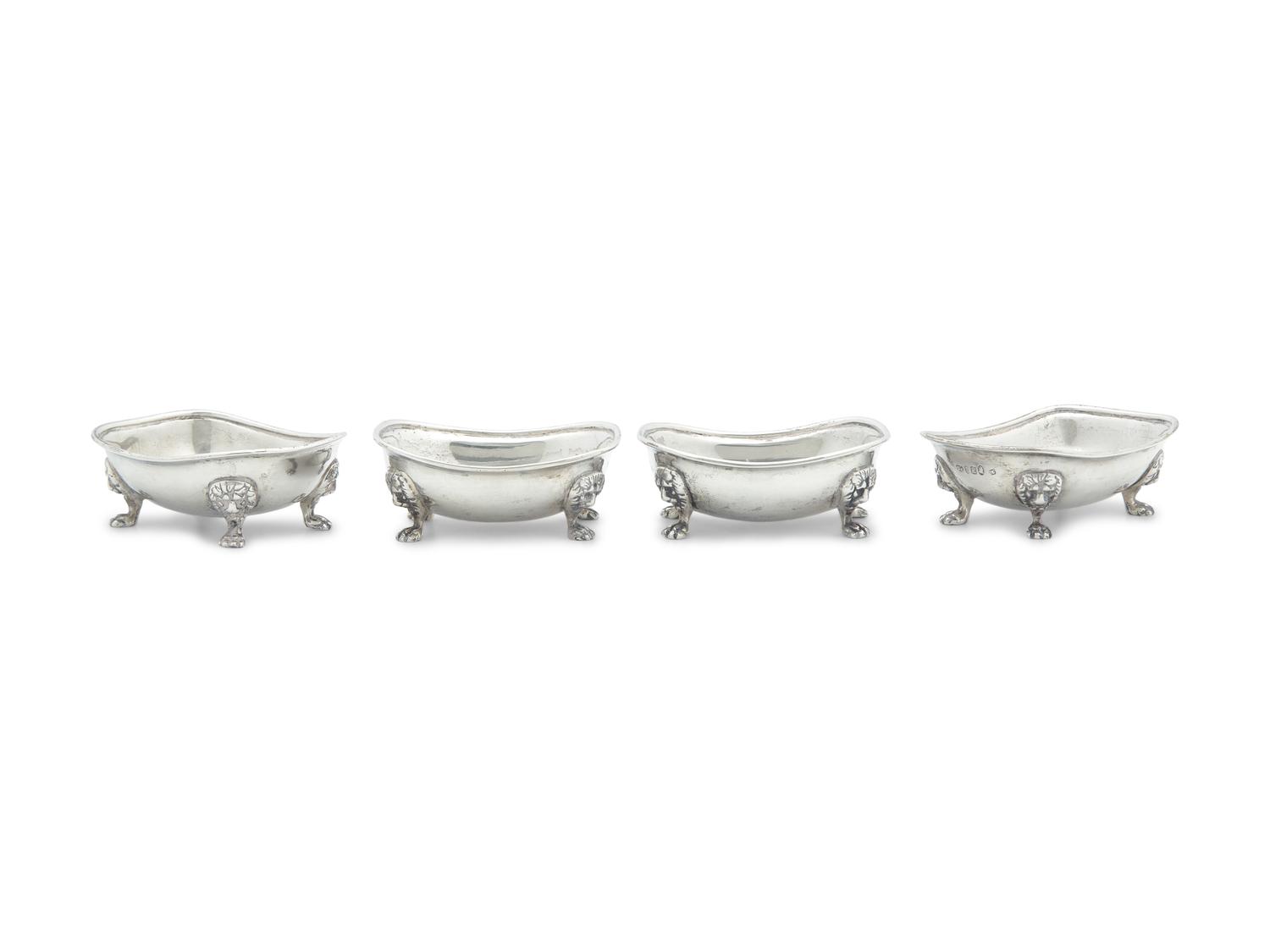 A Set of Four George III Silver Salts with Lion Mask and Paw Feet