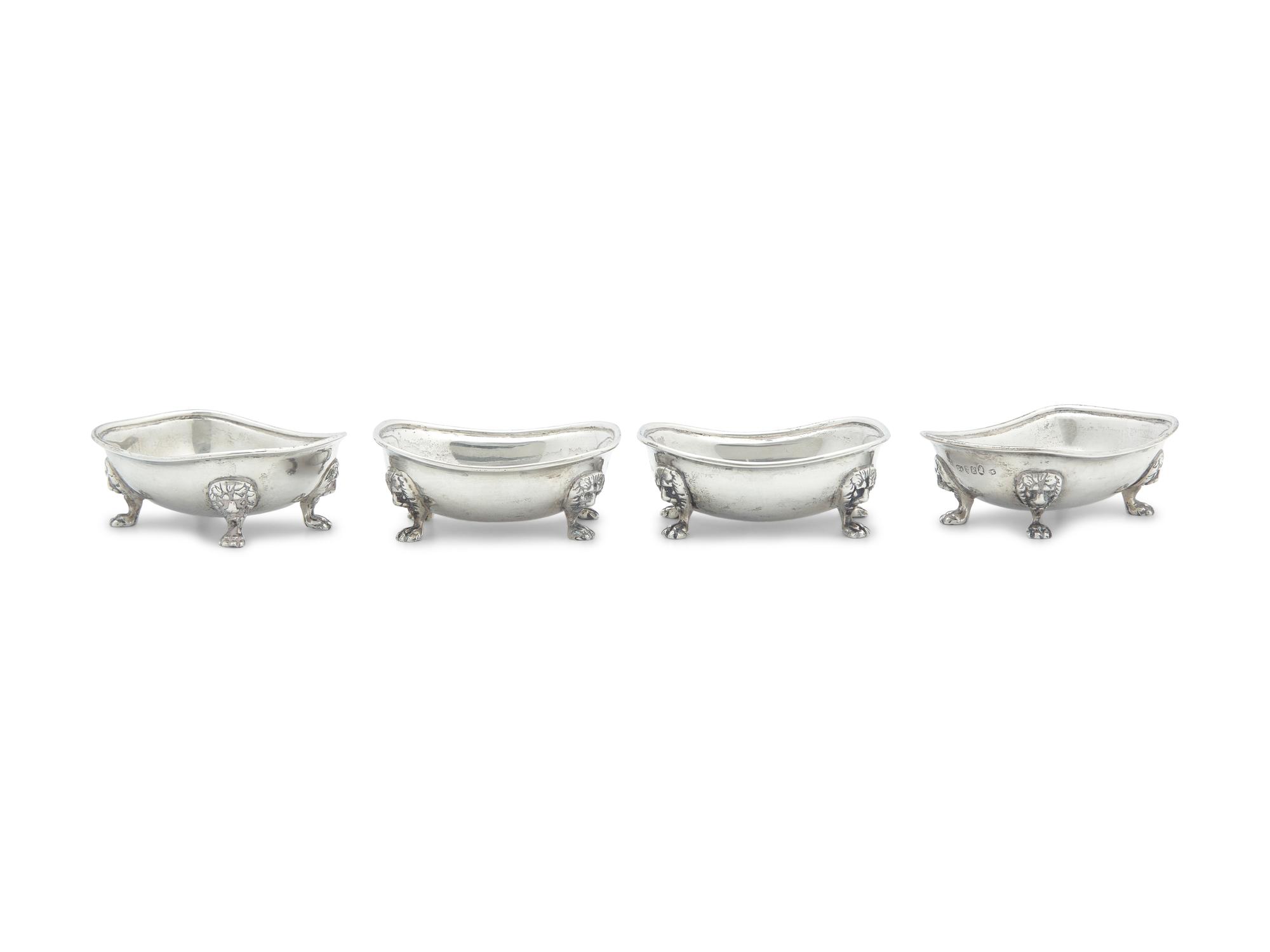 A Set of Four George III Silver Salts with Lion Mask and Paw Feet