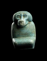 An Egyptian Faience Kneeling Baboon
