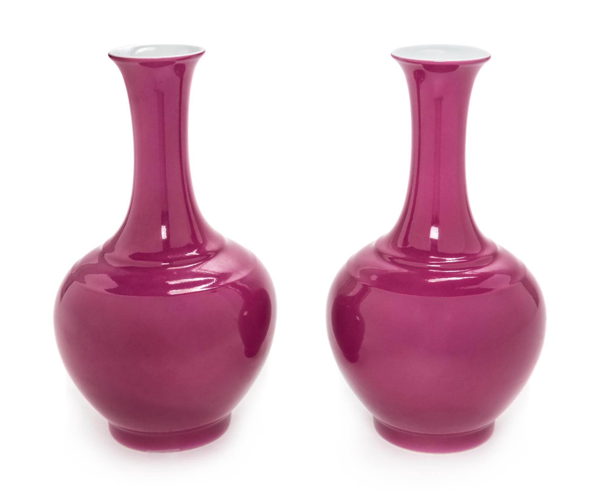 A Pair of Chinese Ruby Red Glazed Porcelain Bottle Vases Height 8 3/4 inches. — 20TH CENTURY