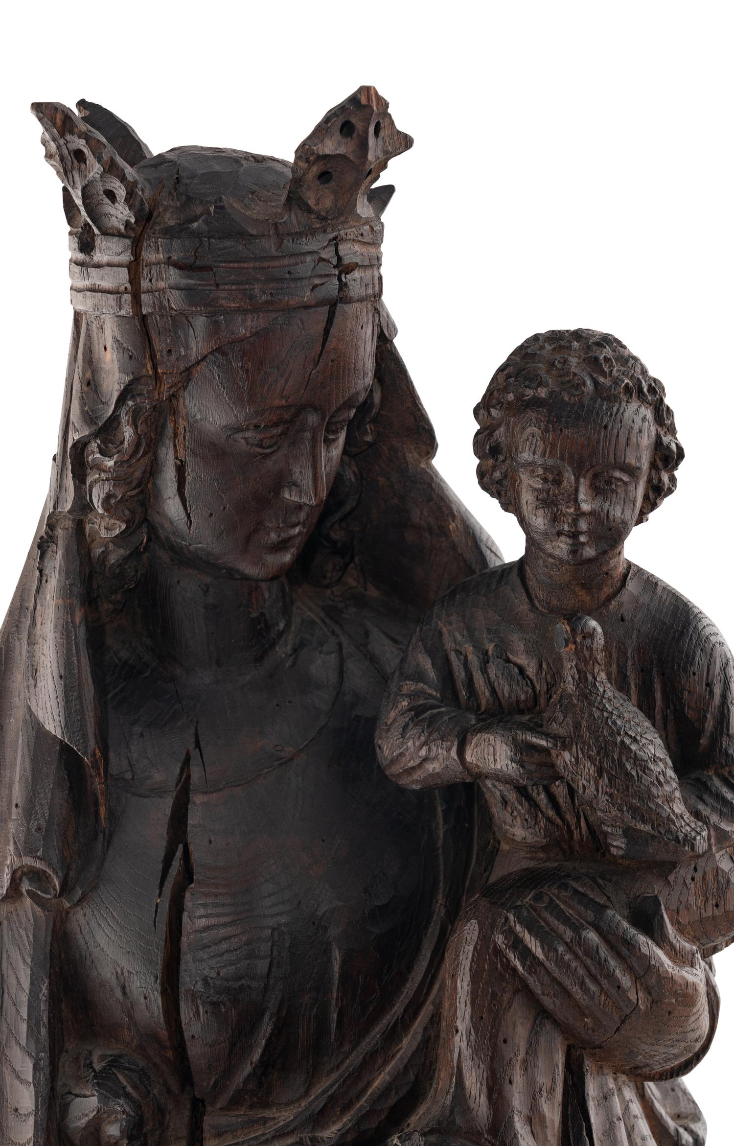 A Carved Oak Figural Group of the Madonna and Child