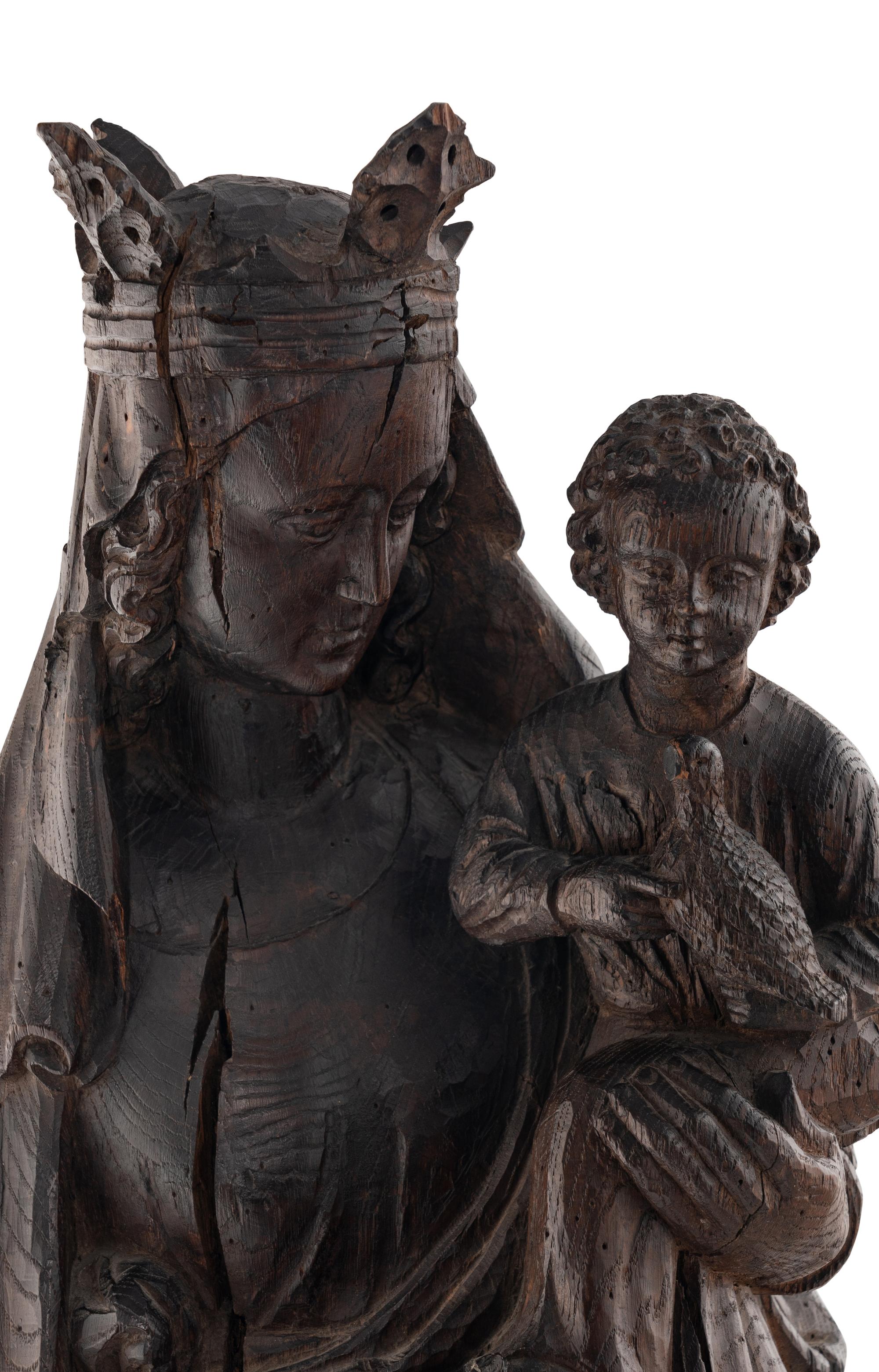 A Carved Oak Figural Group of the Madonna and Child