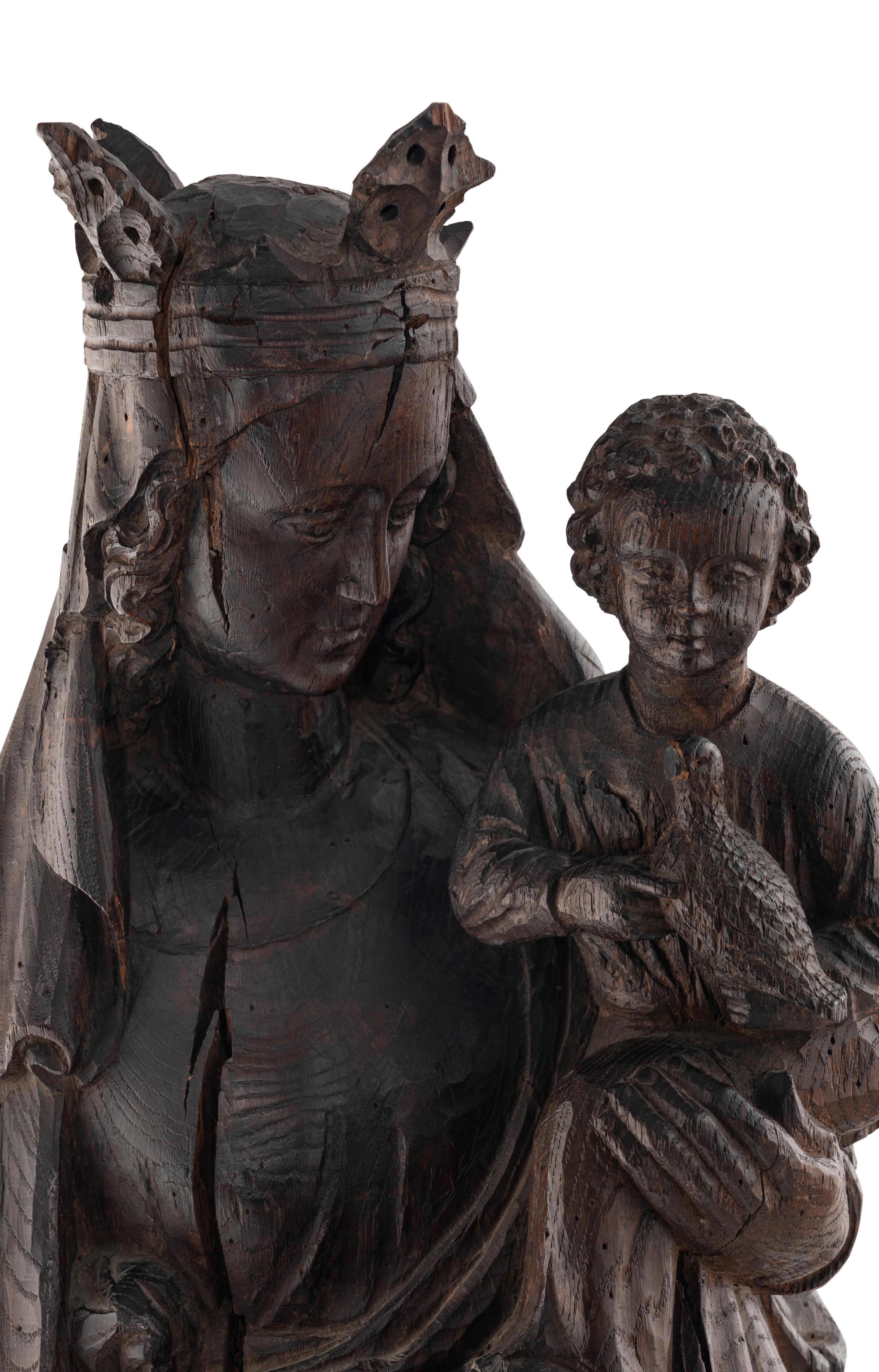 A Carved Oak Figural Group of the Madonna and Child