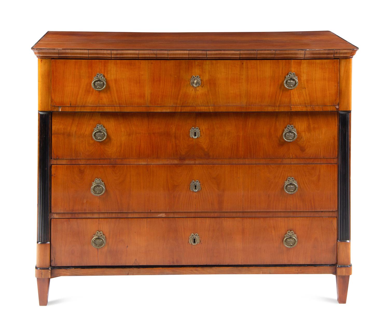 An Austrian Neoclassical Part-Ebonized Walnut Commode
